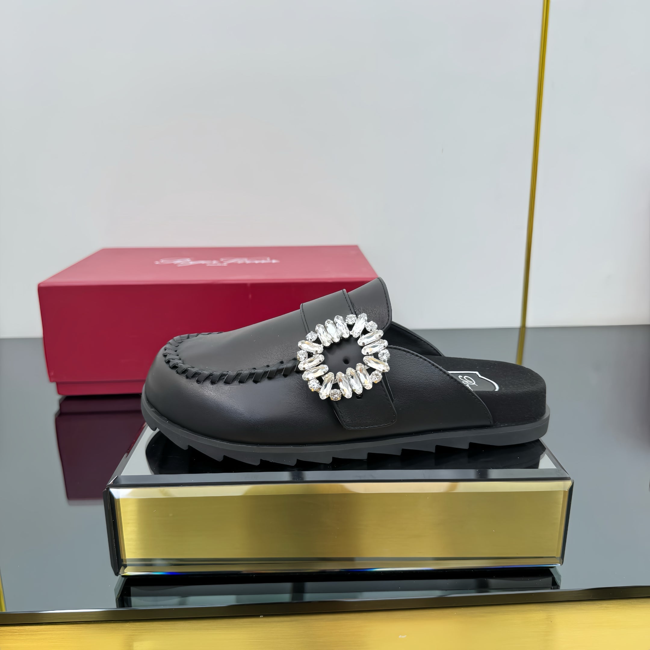 SLIDY VIV' MULES IN BLACK CALFSKIN