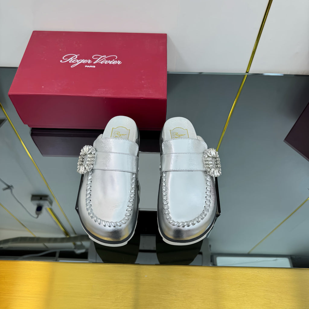 SLIDY VIV' MULES IN SILVER PATENT CALFSKIN