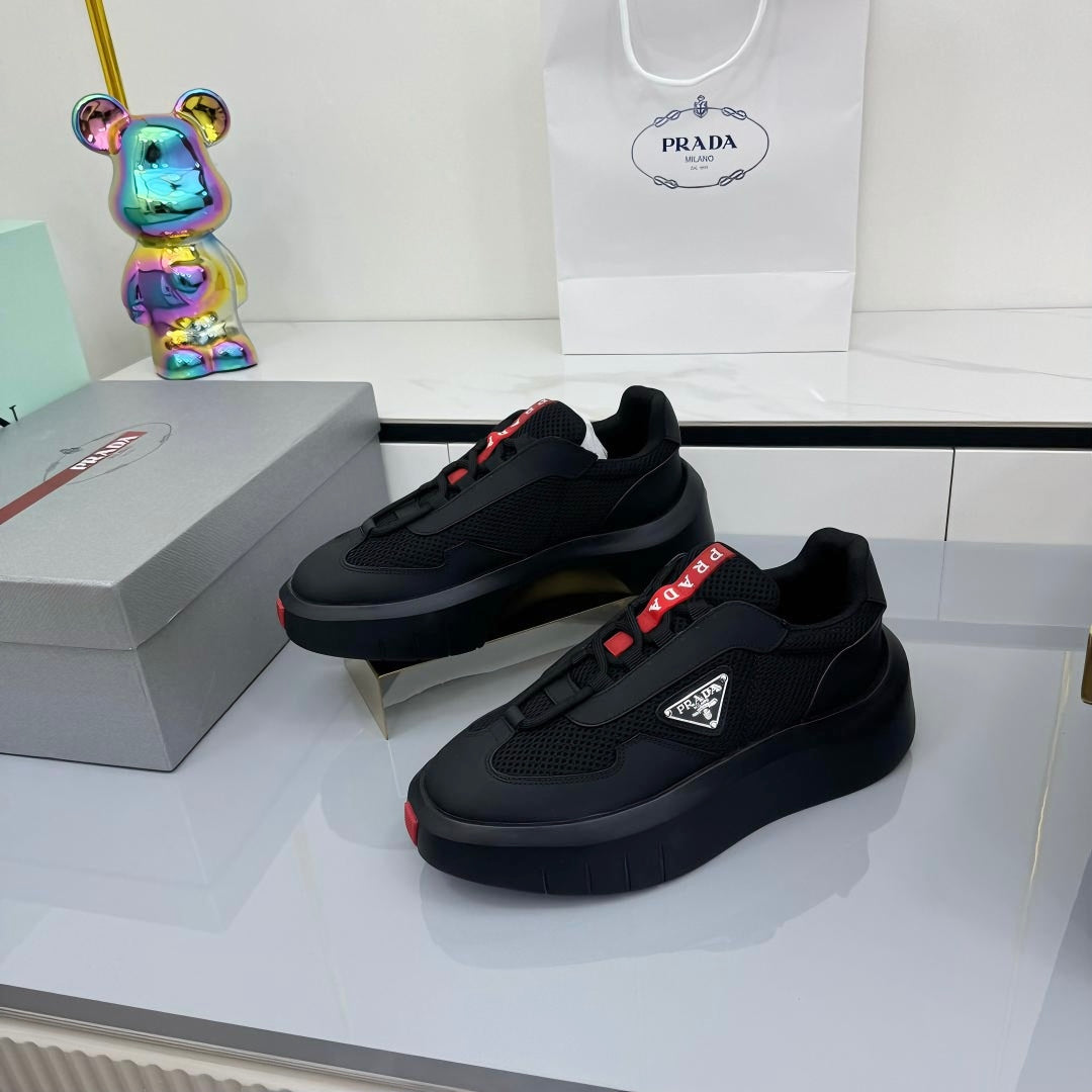 PRADA 25S CROSS LACED SNEAKERS IN BLACK CALFSKIN