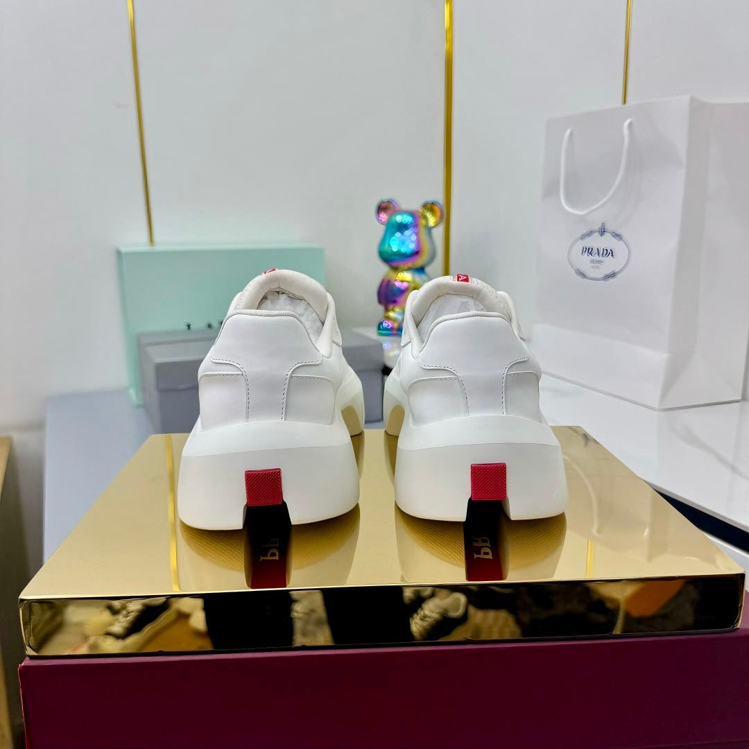 PRADA 25S SNEAKERS IN WHITE CALFSKIN