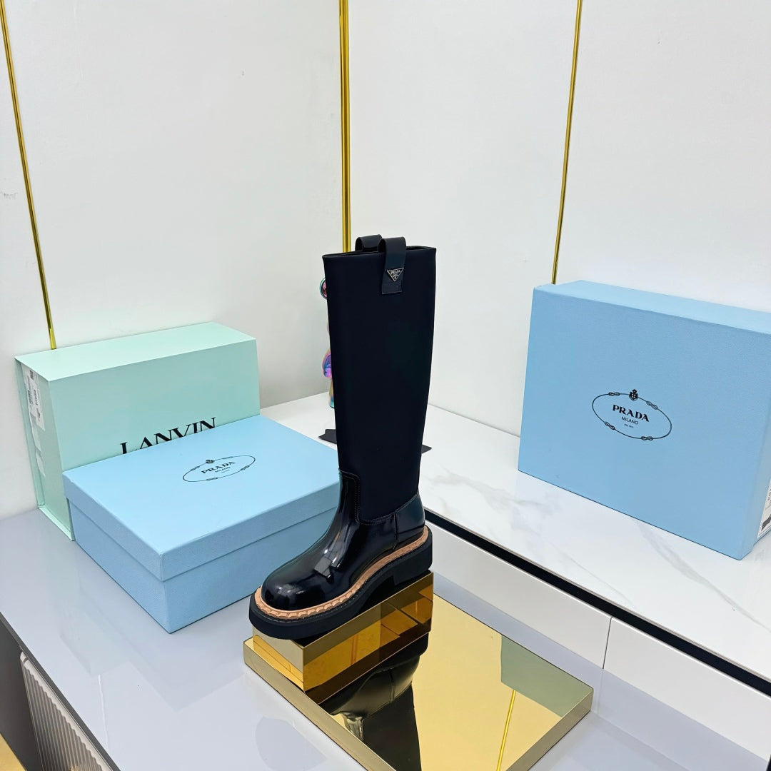 PRADA 25S HIGH BOOTS MARTIN 50MM IN BLACK GLOSSY CALFSKIN WITH LOGO