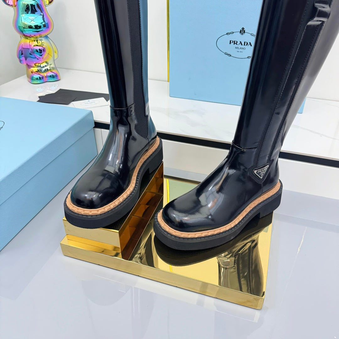 PRADA 25S TALL CHELSEA BOOTS 50MM IN BLACK GLOSSY CALFSKIN