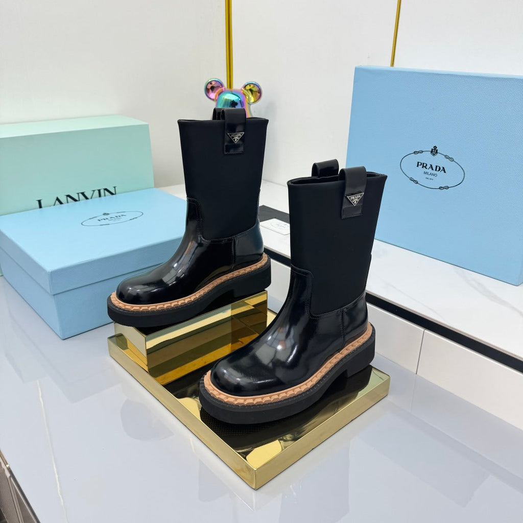 PRADA 25S HIGH MARTIN BOOTS 50MM IN BLACK GLOSSY CALFSKIN