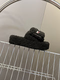 BALENCIAGA 25S SLIPPERS IN BLACK FAUX SHEARLING