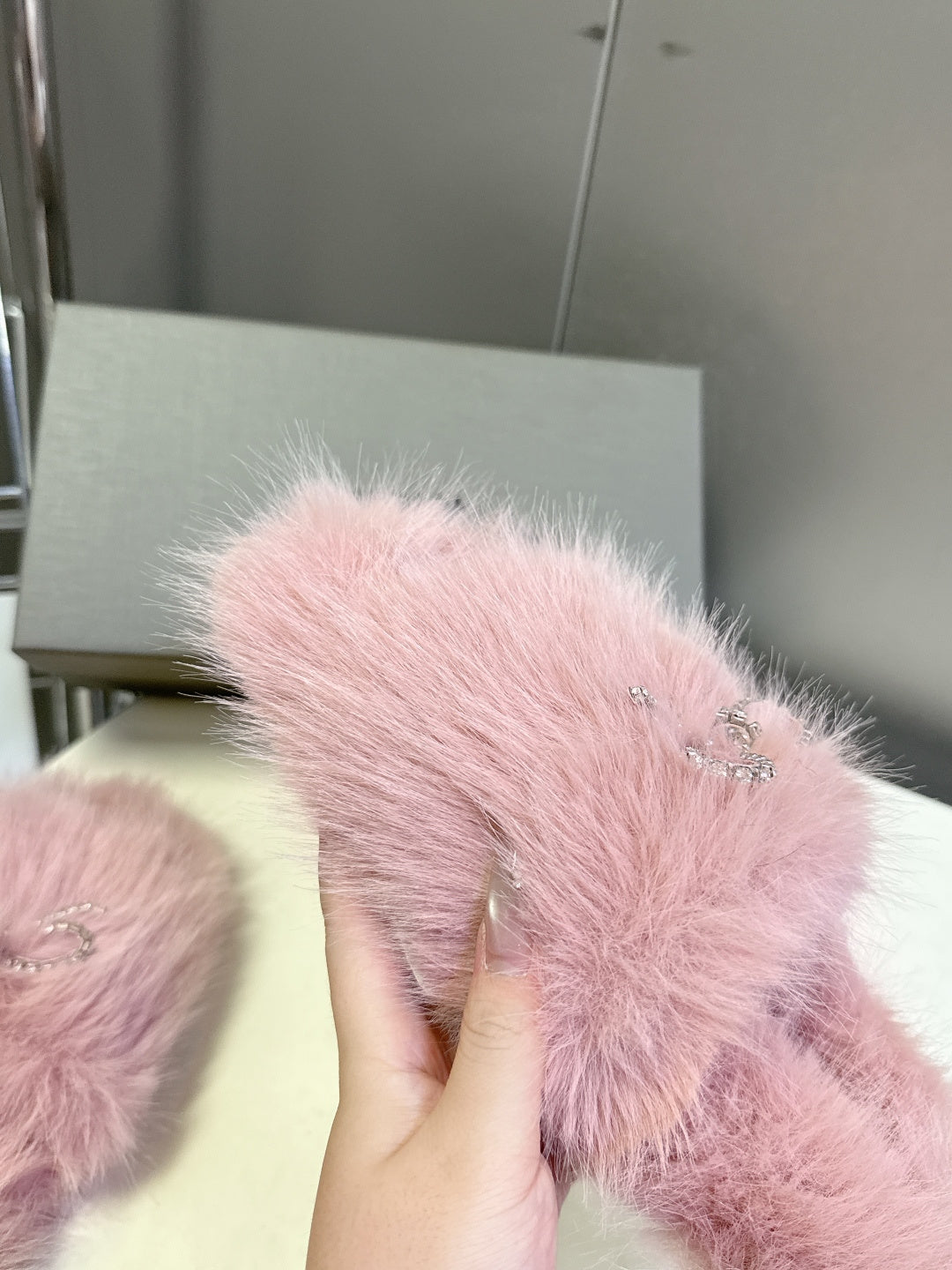 BALENCIAGA 25S SOFT FUR SLIPPERS IN LIGHT PINK FUR WITH RHINESTONE BOW