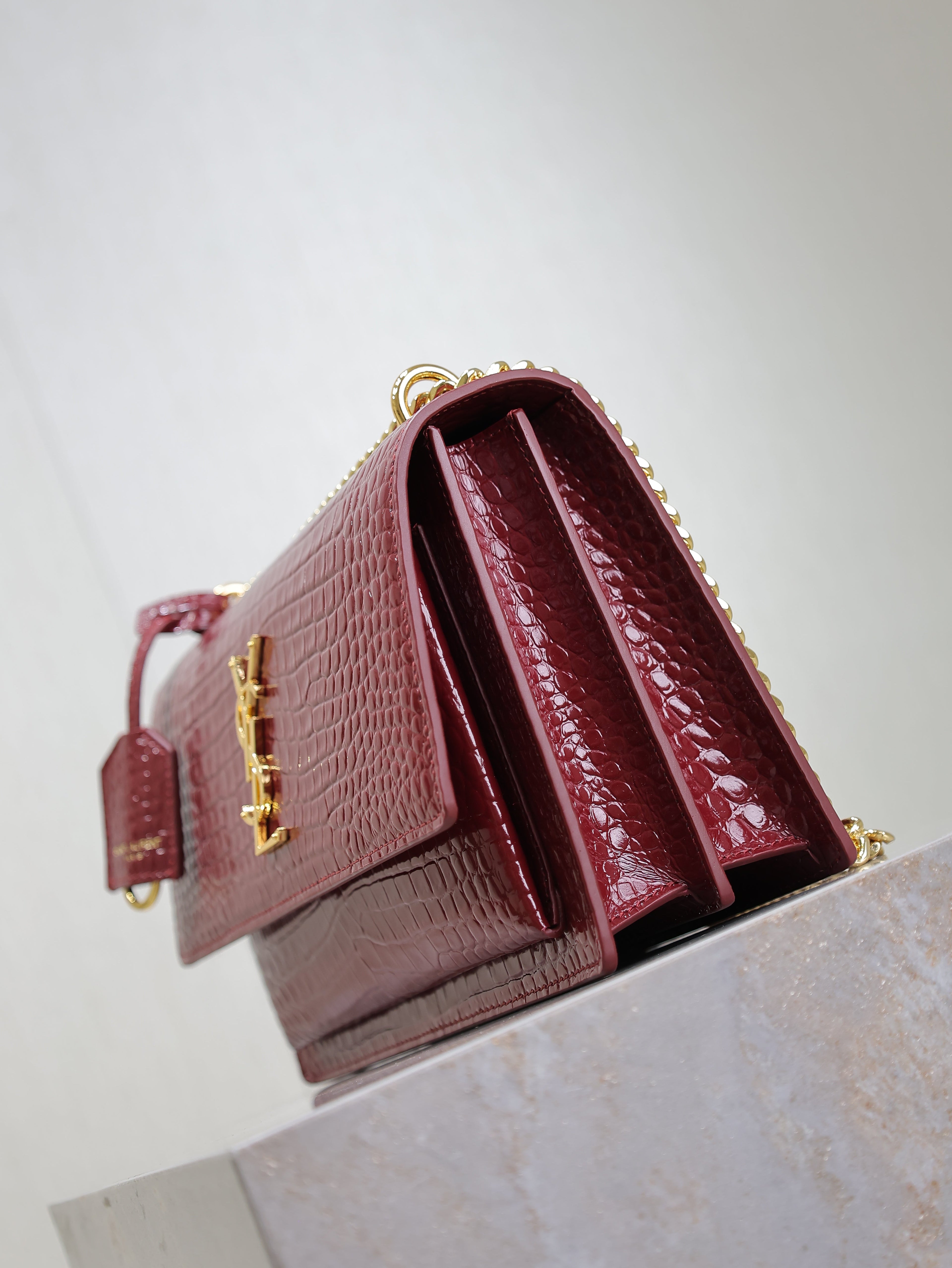 YSL 25S SUNSET MEDIUM 22 IN CRIMSON RED CROCODILE-EMBOSSED CALFSKIN GOLD HARDWARE