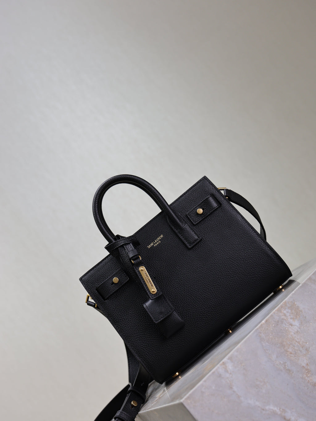 YSL 25S SAC DE JOUR 22 IN BLACK SUPPLE GRAINED CALFSKIN GOLD HARDWARE