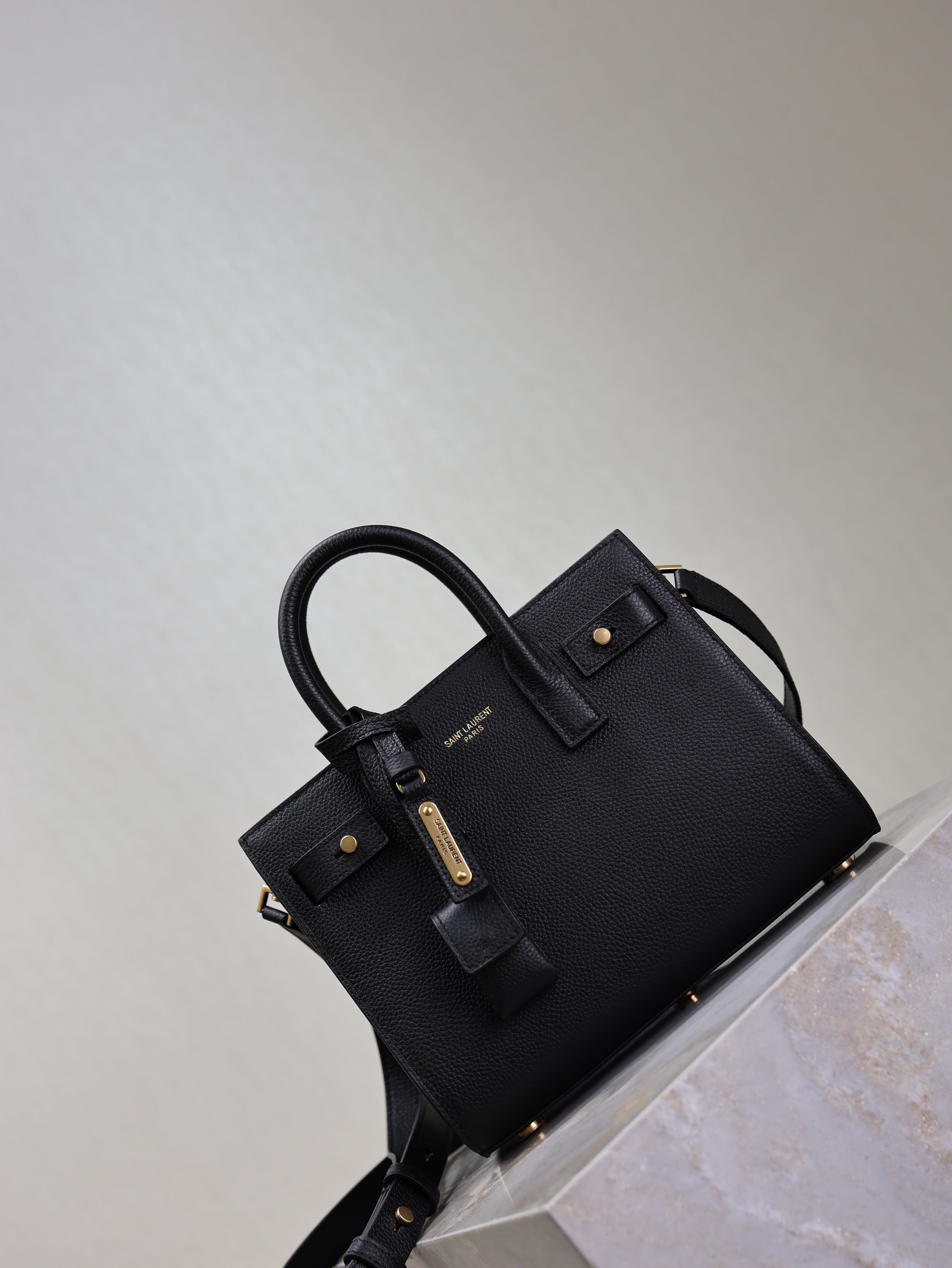 YSL 25S SAC DE JOUR 22 IN BLACK SUPPLE GRAINED CALFSKIN GOLD HARDWARE