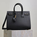 YSL 25S SAC DE JOUR GM 32 IN BLACK SUPPLE GRAINED CALFSKIN GOLD HARDWARE
