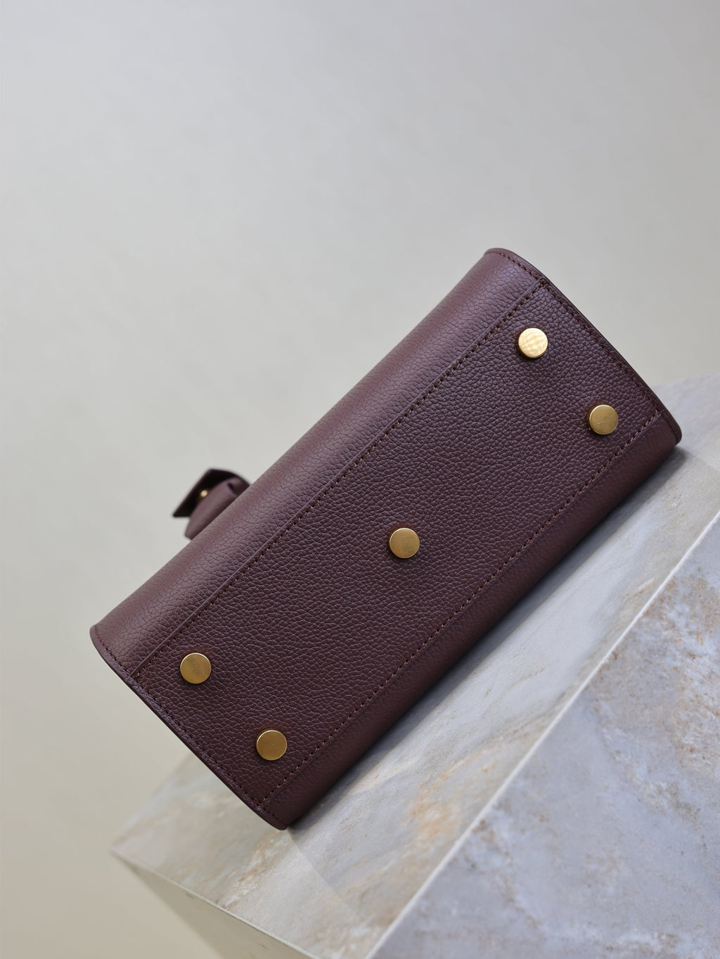 YSL 25S SAC DE JOUR 22 IN ROUGE CABERNET SUPPLE GRAINED CALFSKIN