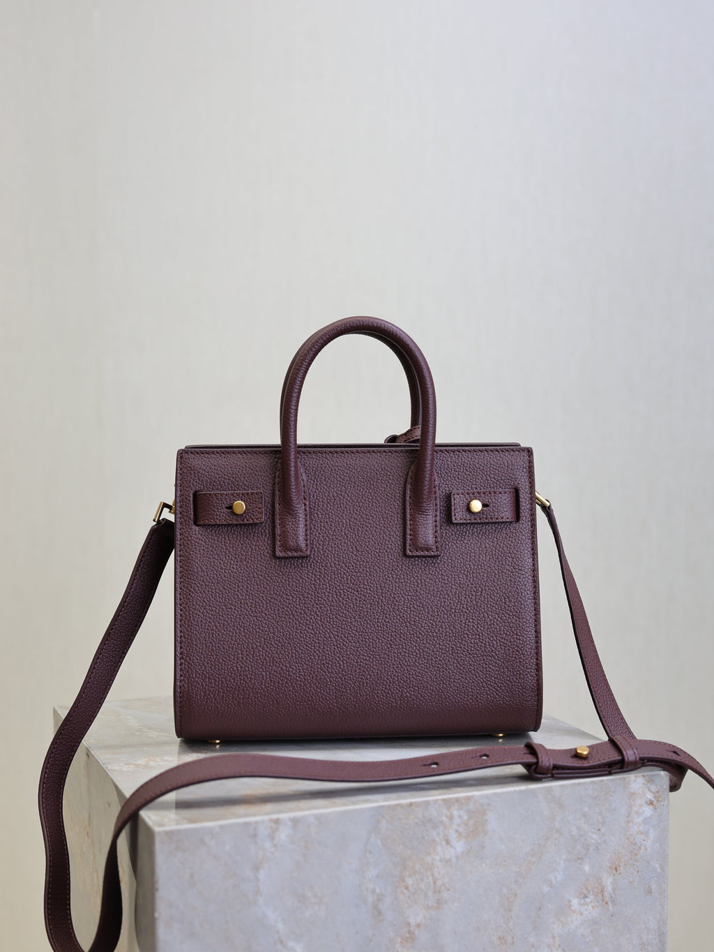 YSL 25S SAC DE JOUR 22 IN ROUGE CABERNET SUPPLE GRAINED CALFSKIN