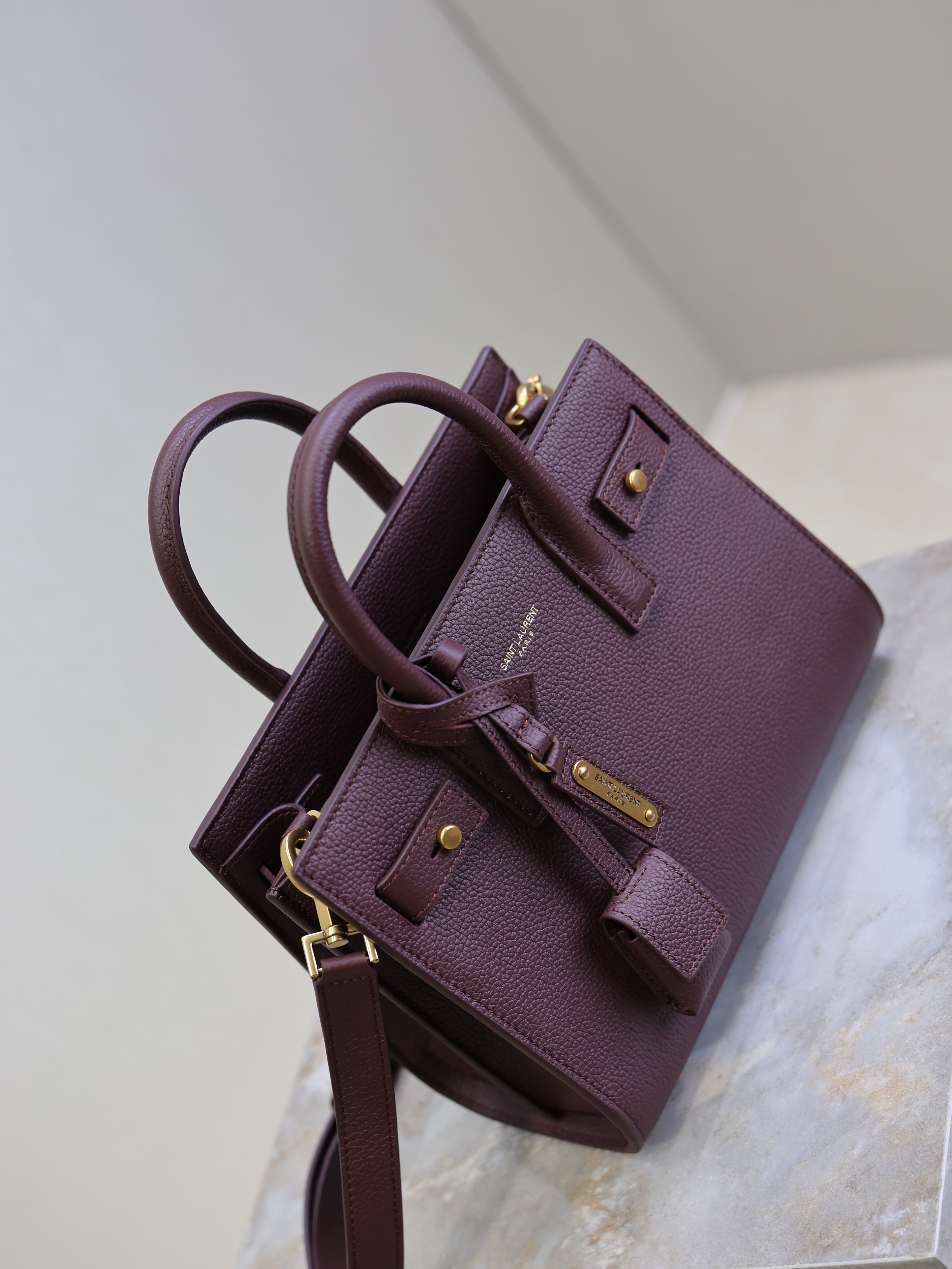YSL 25S SAC DE JOUR 22 IN ROUGE CABERNET SUPPLE GRAINED CALFSKIN