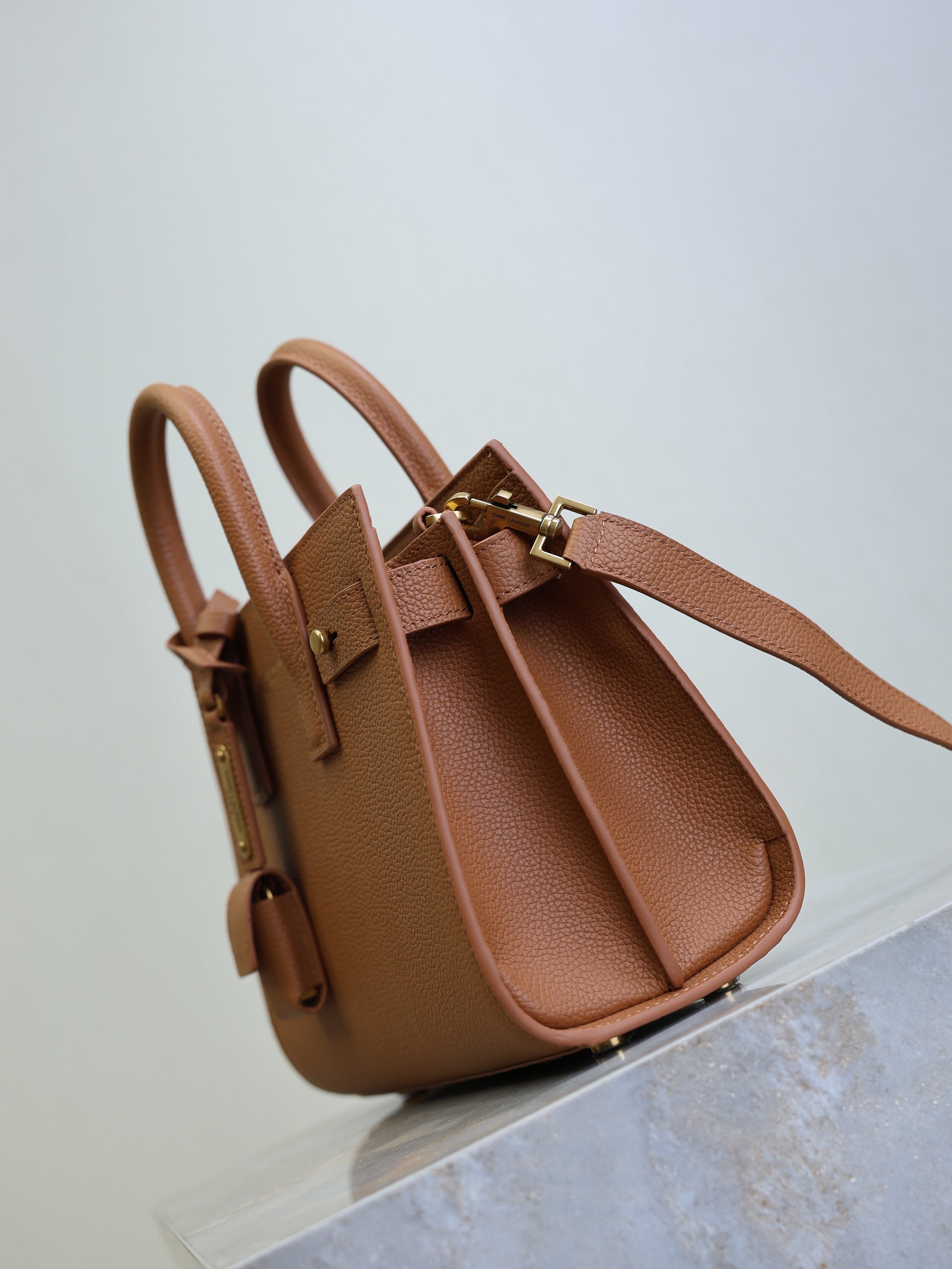 YSL 25S SAC DE JOUR 22 IN CHESTNUT BROWN SUPPLE GRAINED CALFSKIN