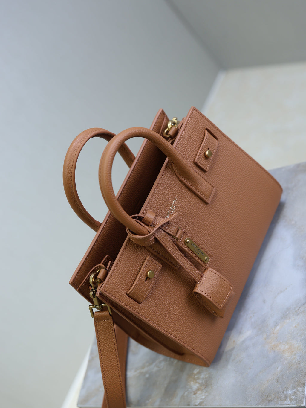YSL 25S SAC DE JOUR 22 IN CHESTNUT BROWN SUPPLE GRAINED CALFSKIN
