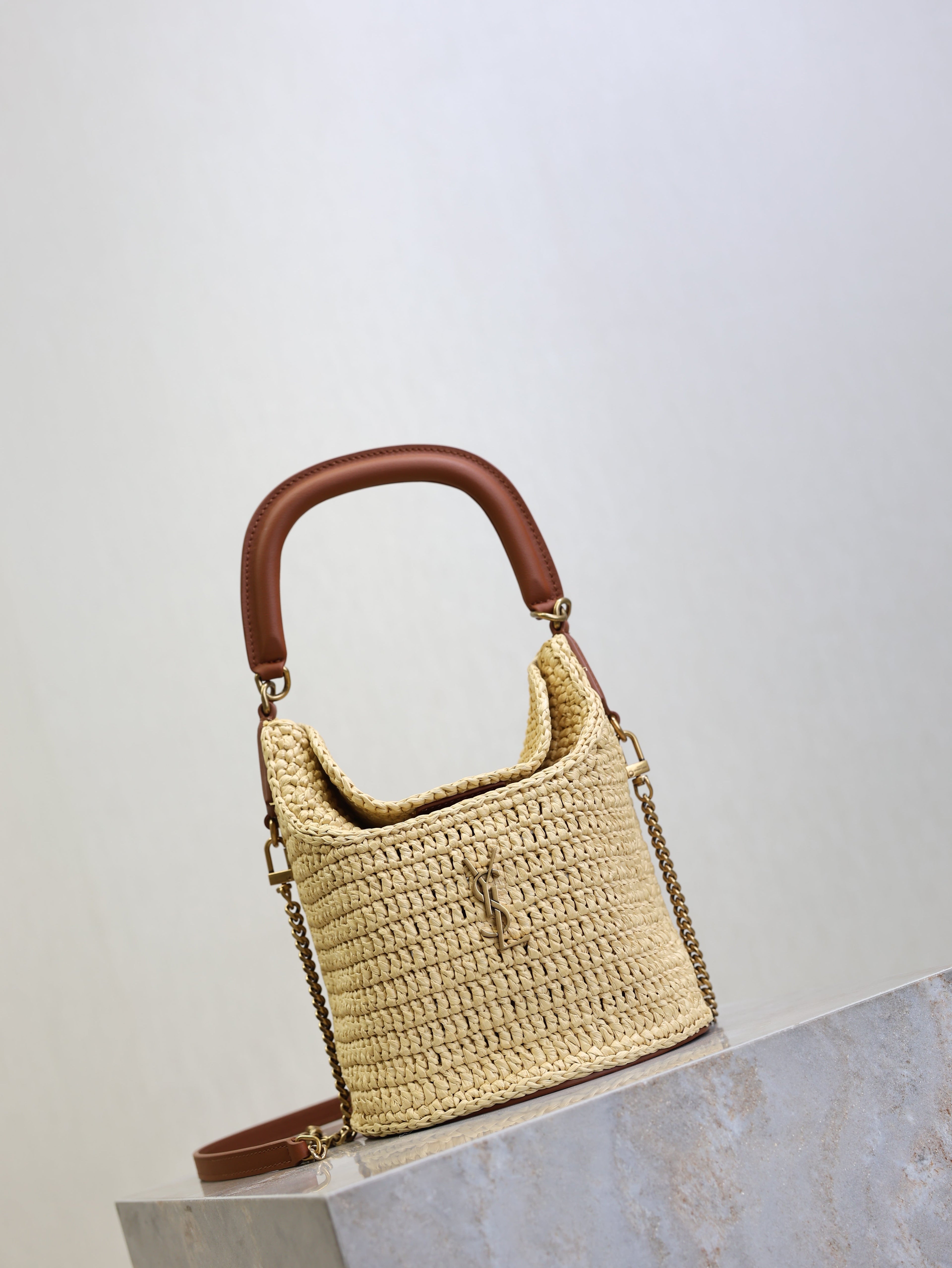 YSL 25S GABY BUCKET BAG 19 IN RAFFIA AND CALFSKIN GOLD HARDWARE