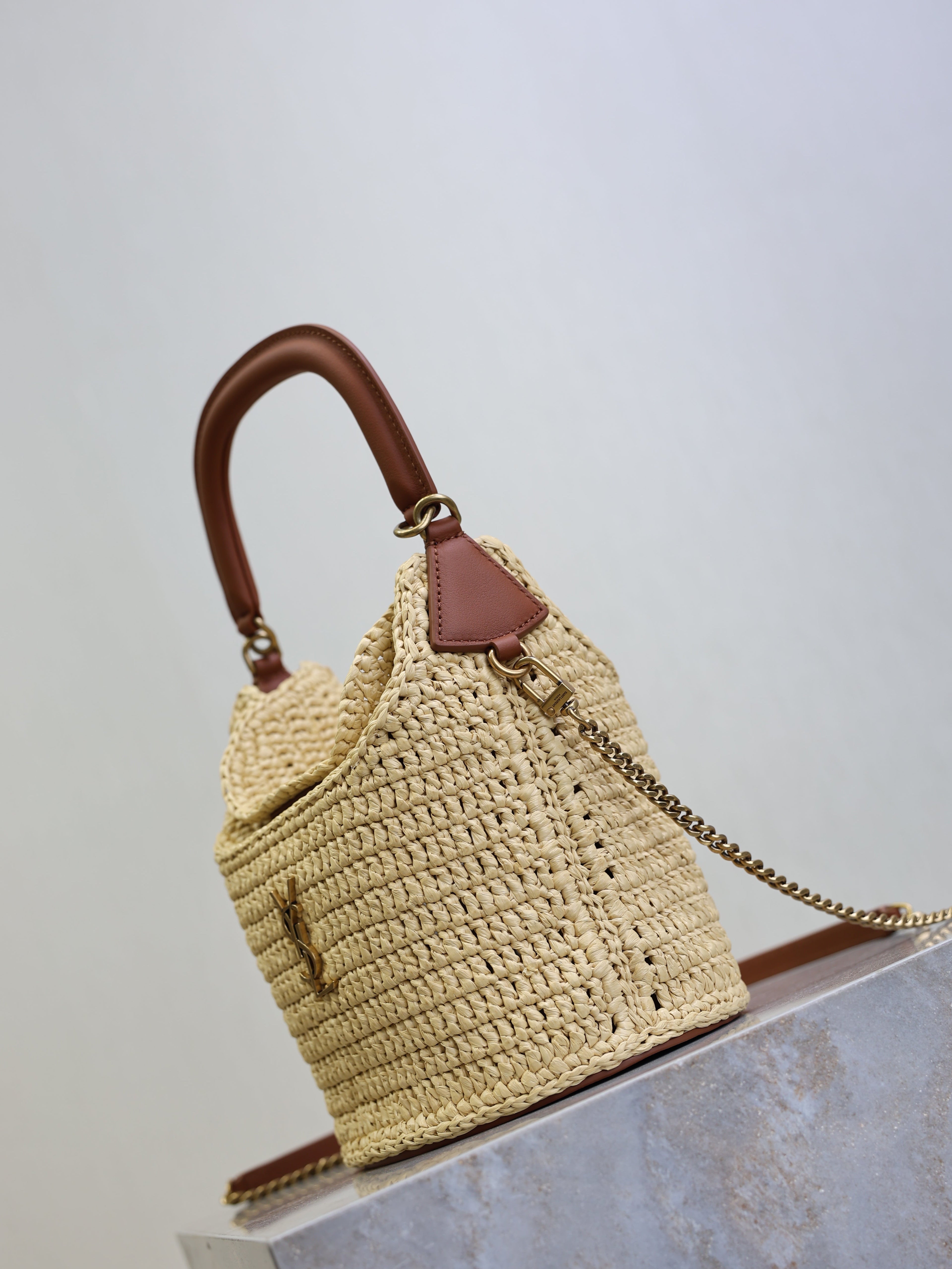 YSL 25S GABY BUCKET BAG 19 IN RAFFIA AND CALFSKIN GOLD HARDWARE