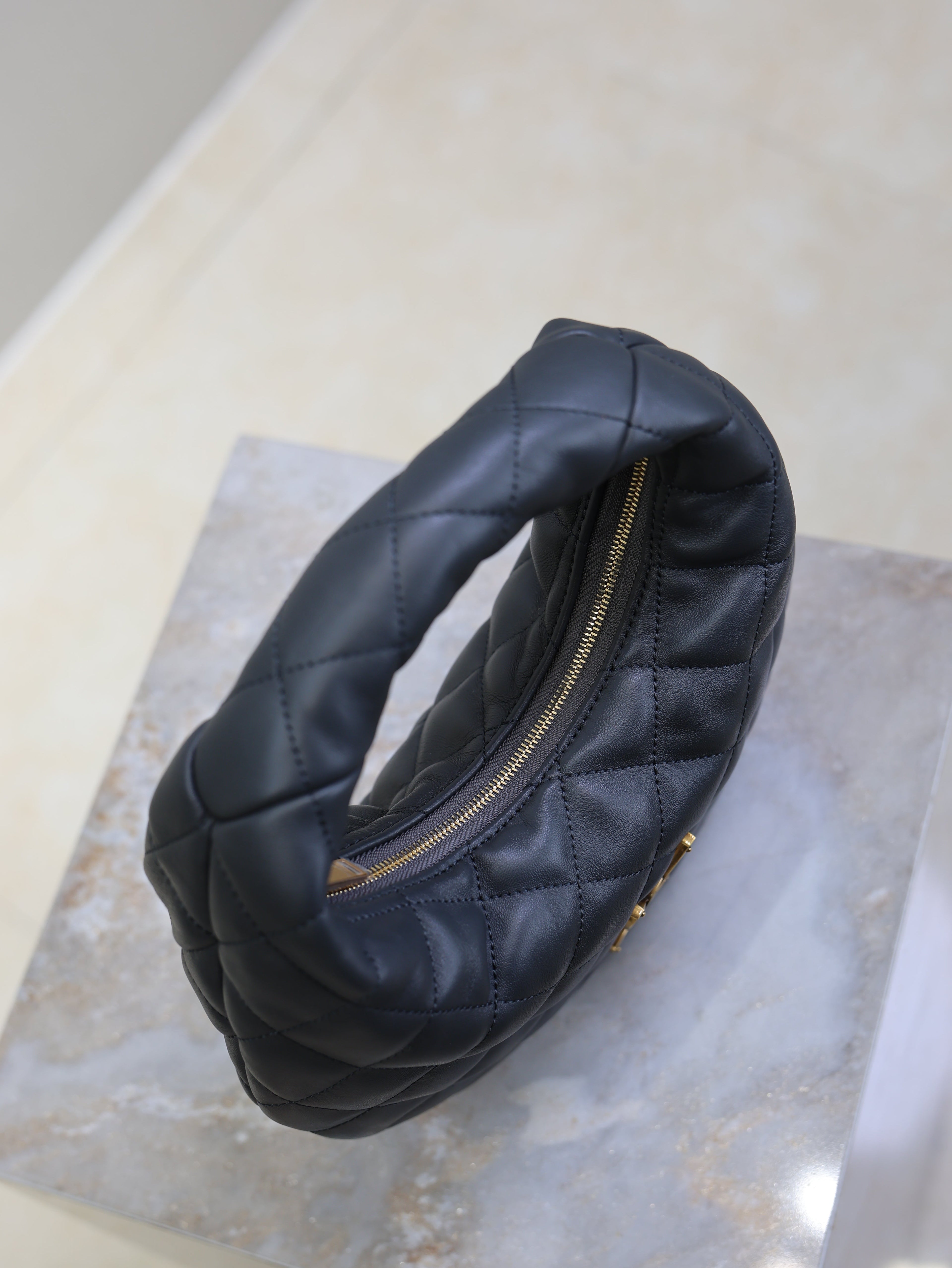 YSL 25S ICARINO 17 IN BLACK QUILTED CALFSKIN GOLD HARDWRE
