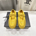 PRADA 25S COLLAPSE RE NYLON AND SUEDE BALLERINAS IN LEMON YELLOW