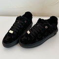 TIME OUT SNEAKER IN BLACK MONOGRAM EMBOSSED SUEDE WITH FLEECE LINING