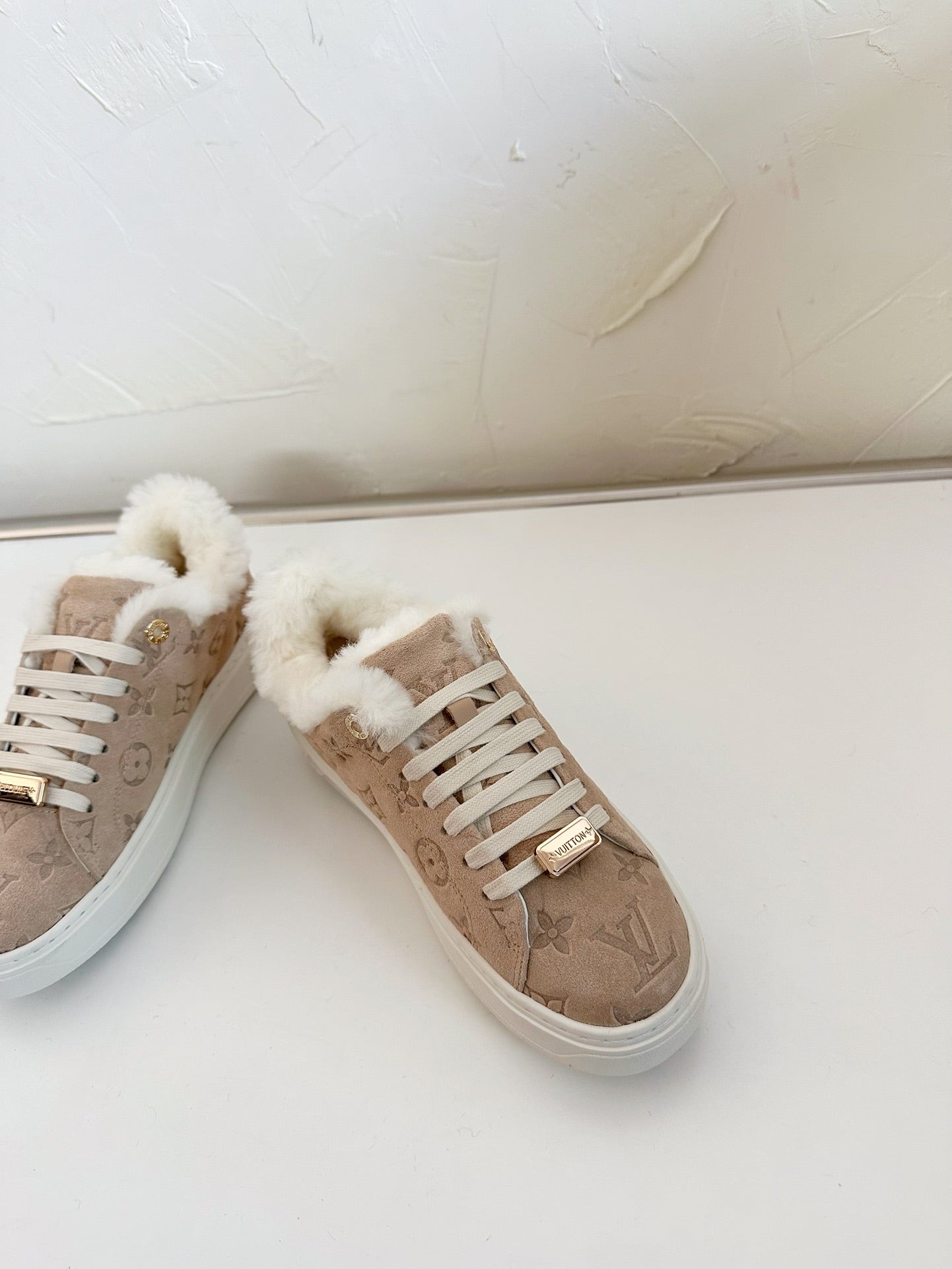 TIME OUT SNEAKER IN DESERT BROWN MONOGRAM EMBOSSED SUEDE WITH FLEECE LINING