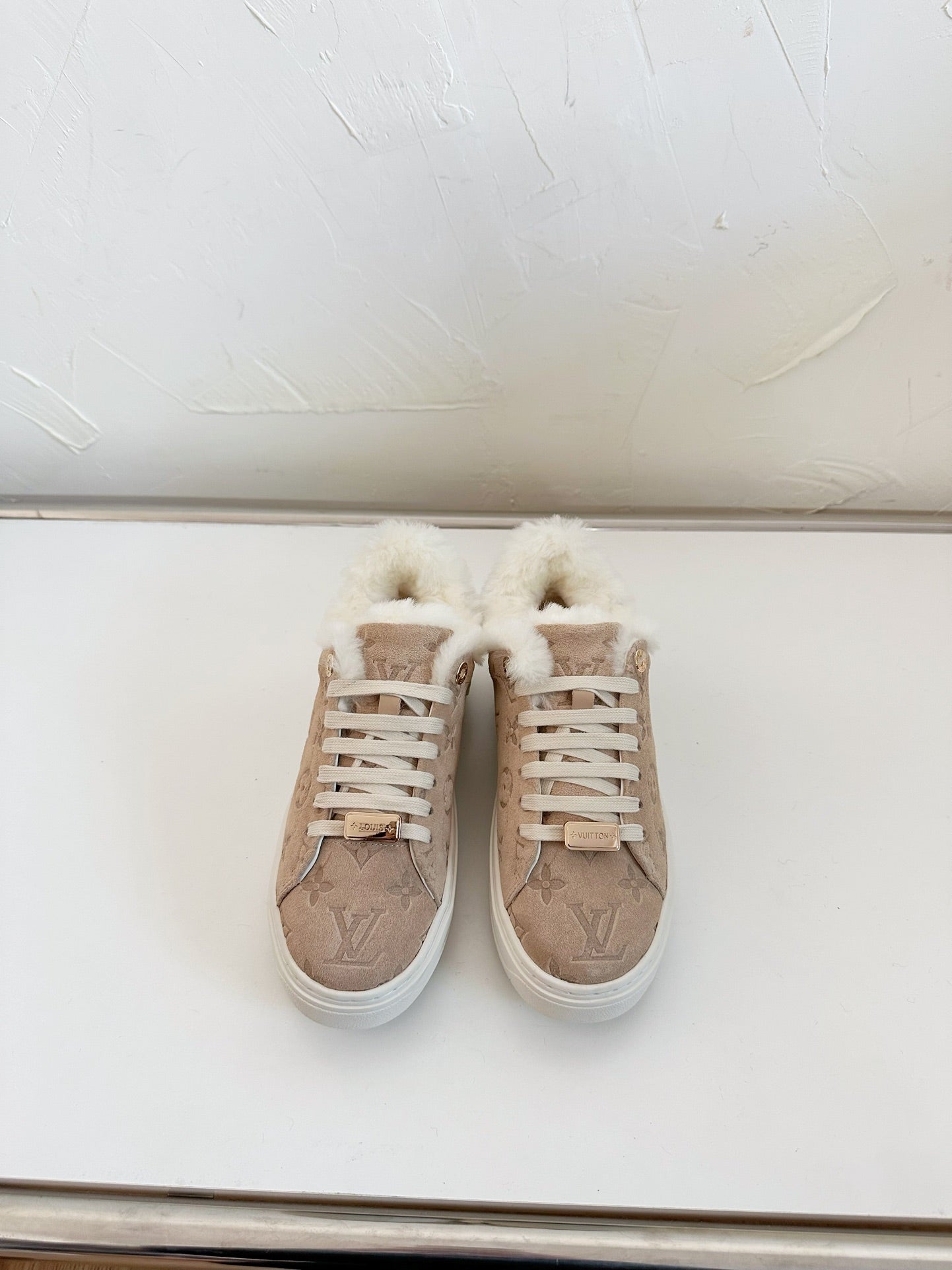TIME OUT SNEAKER IN DESERT BROWN MONOGRAM EMBOSSED SUEDE WITH FLEECE LINING