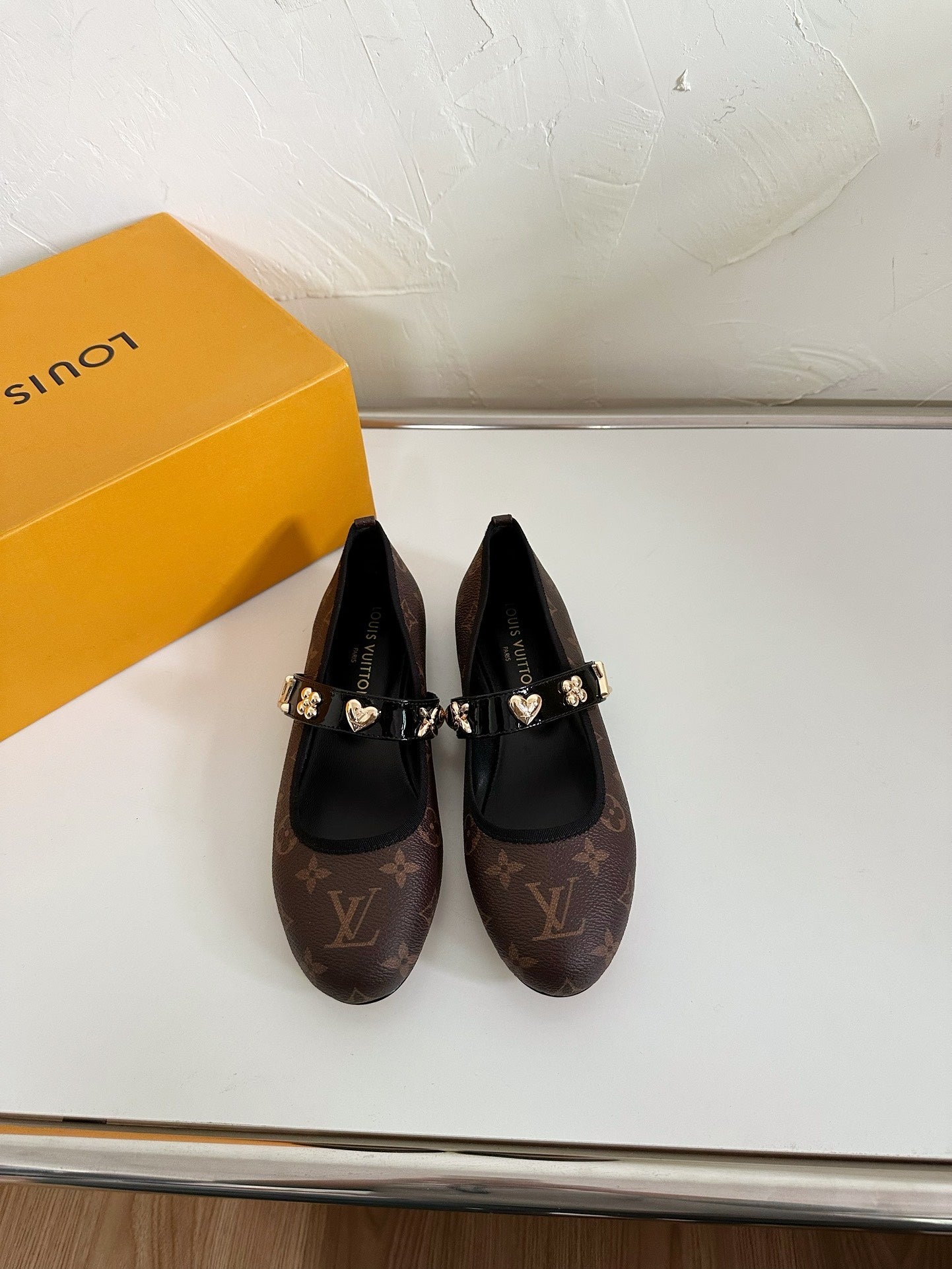 ROMY FLAT BALLERINA IN CHOCOLATE BROWN MONOGRAM CALFSKIN