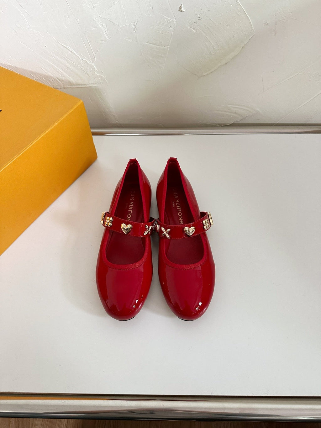 ROMY FLAT BALLERINA IN RUBY RED PATENT CALFSKIN
