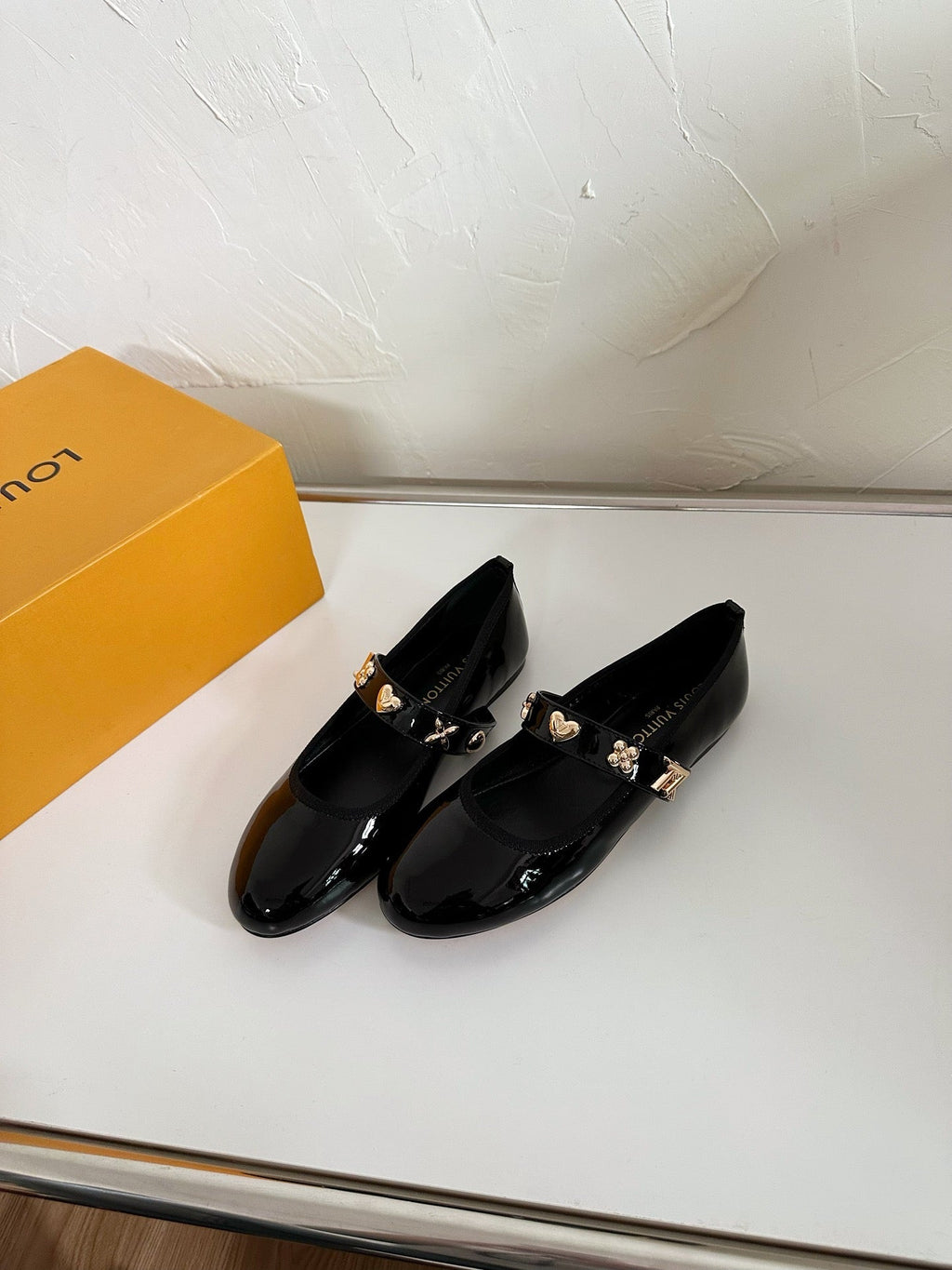 ROMY FLAT BALLERINA IN BLACK PATENT CALFSKIN