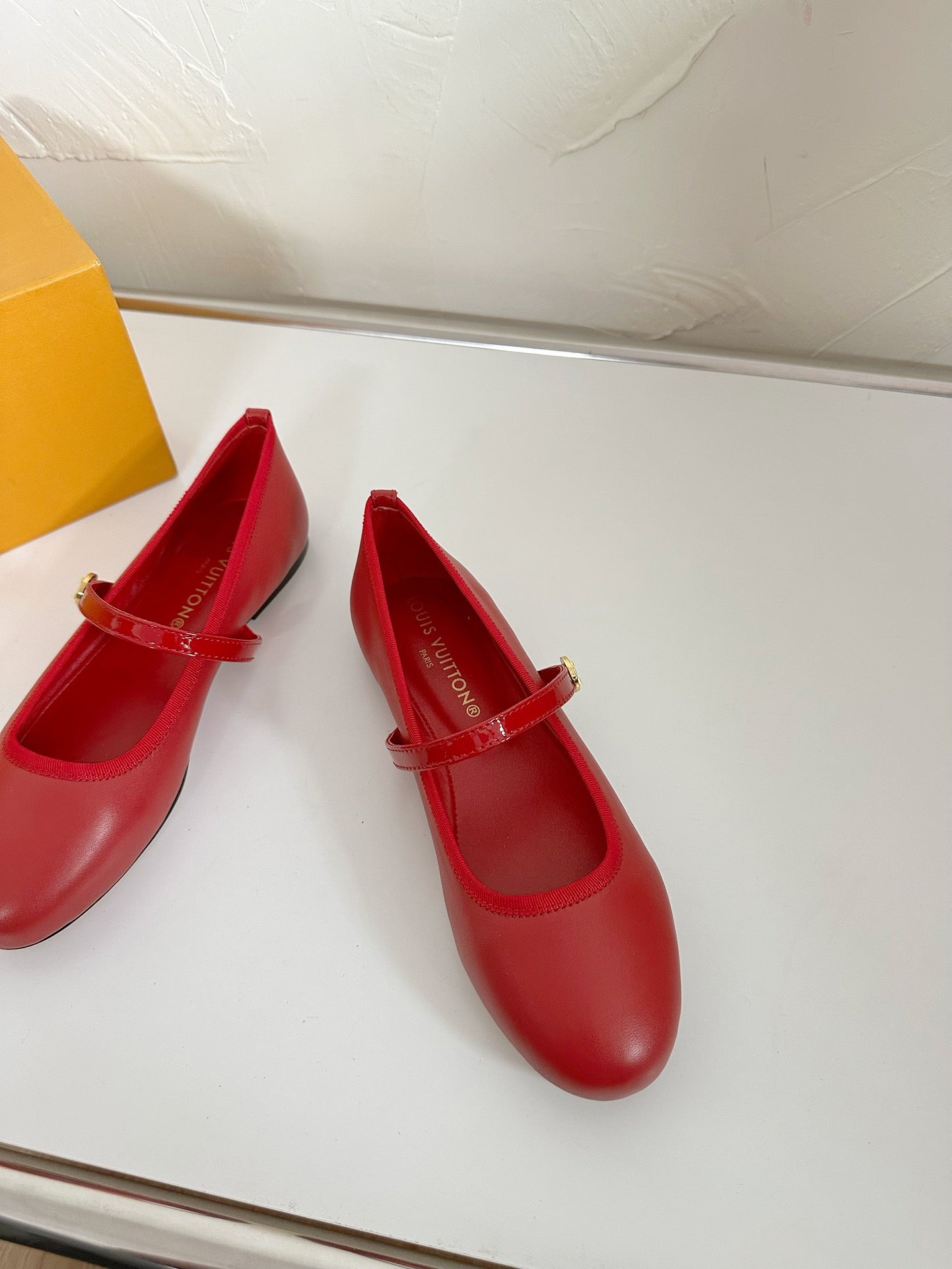 ROMY FLAT BALLERINA IN RUBY RED CALFSKIN