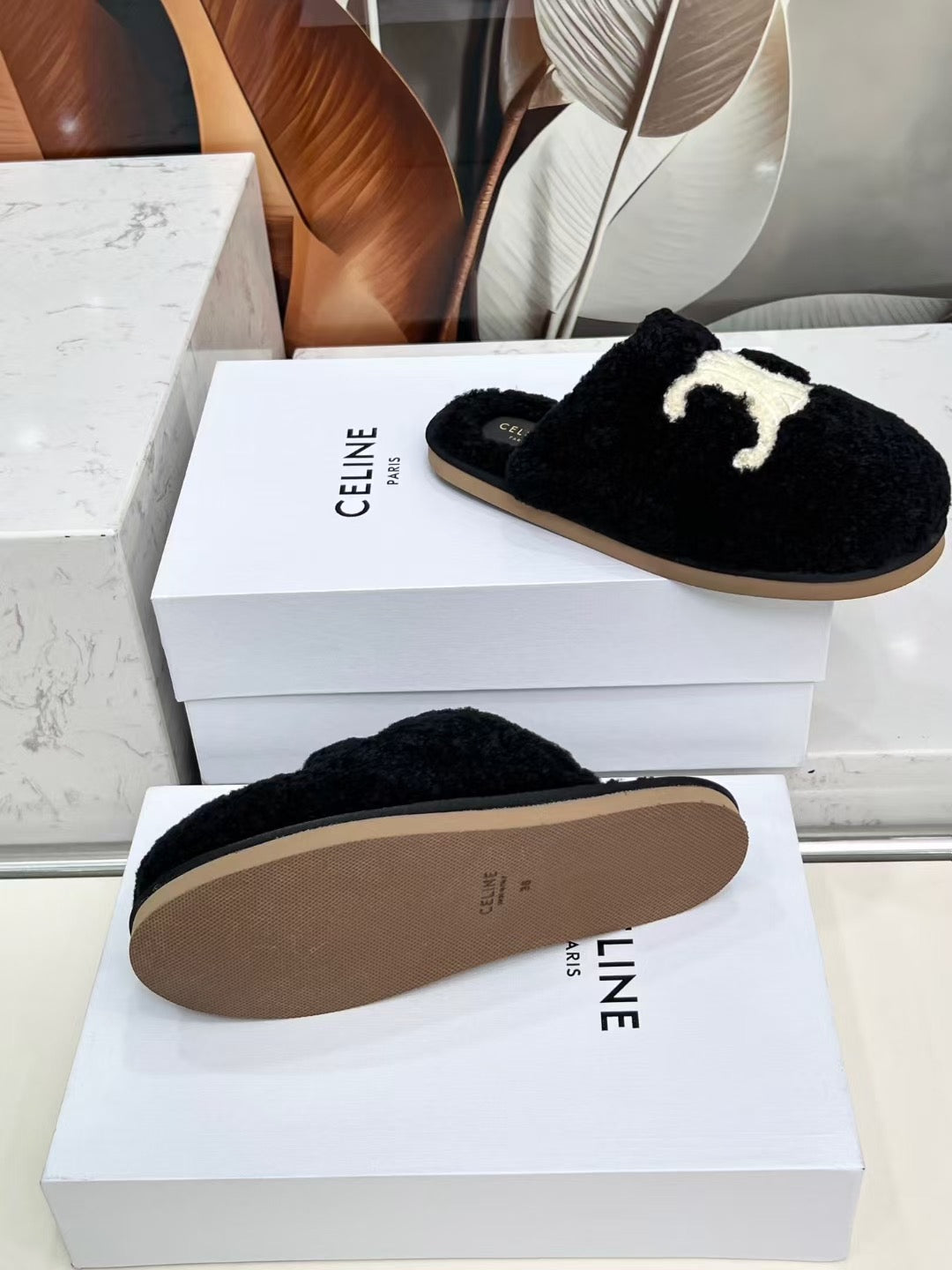 CELINE 25S GEORGIA SLIDE IN SHEARLING IN BLACK