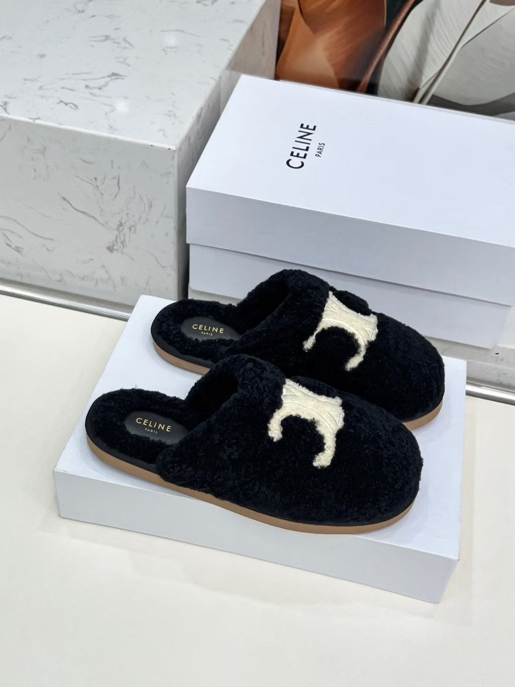 CELINE 25S GEORGIA SLIDE IN SHEARLING IN BLACK