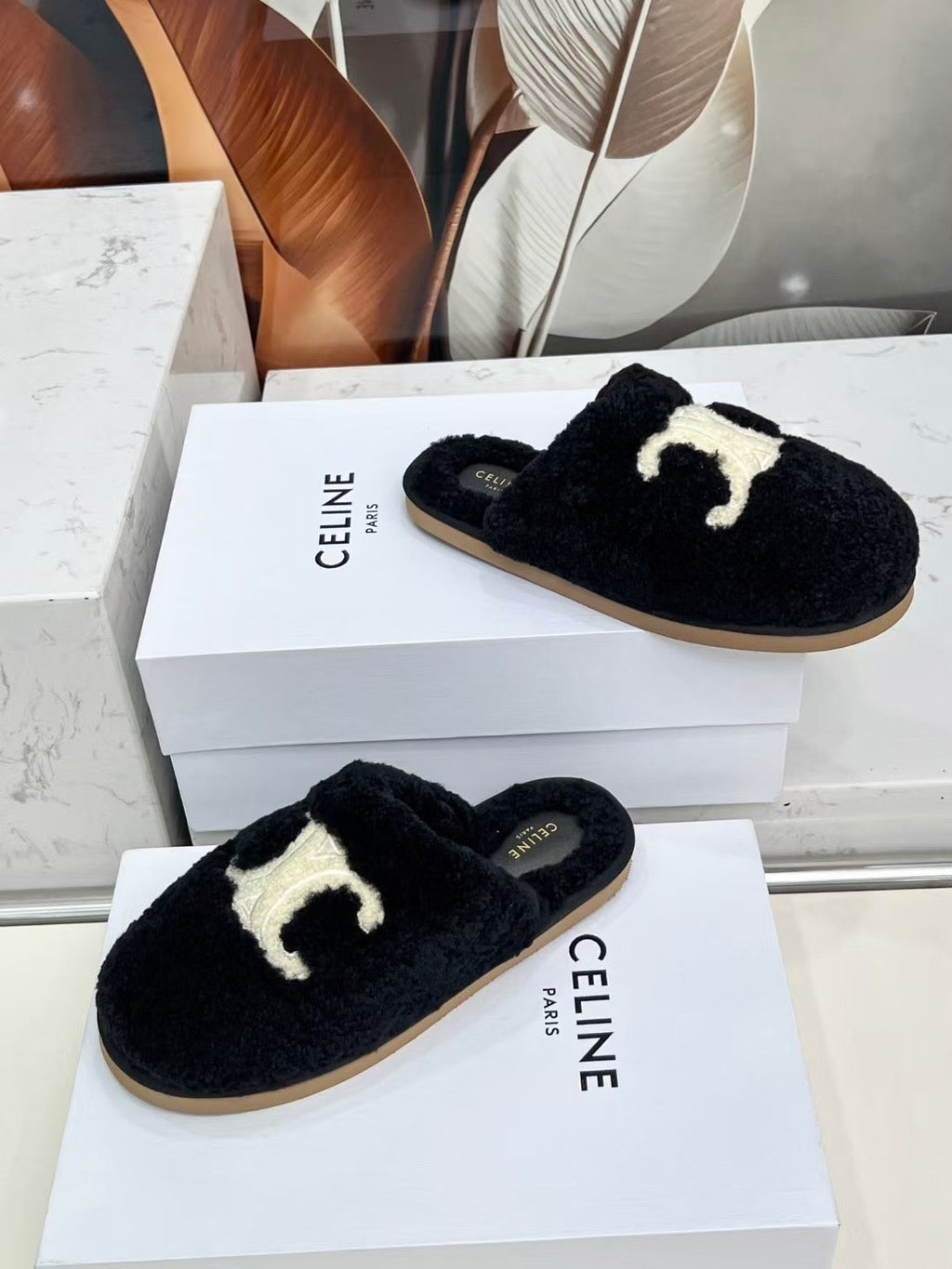 CELINE 25S GEORGIA SLIDE IN SHEARLING IN BLACK