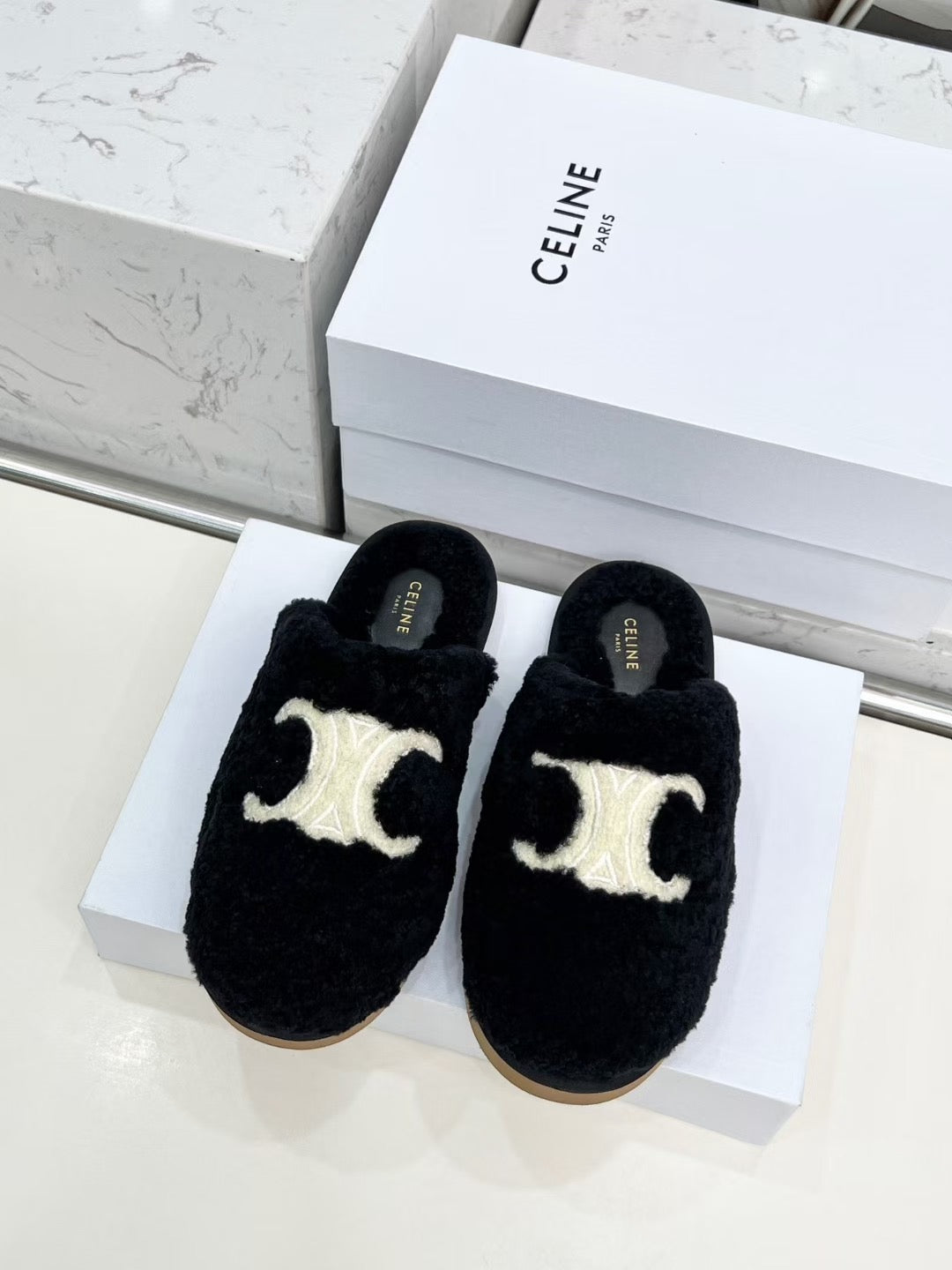 CELINE 25S GEORGIA SLIDE IN SHEARLING IN BLACK