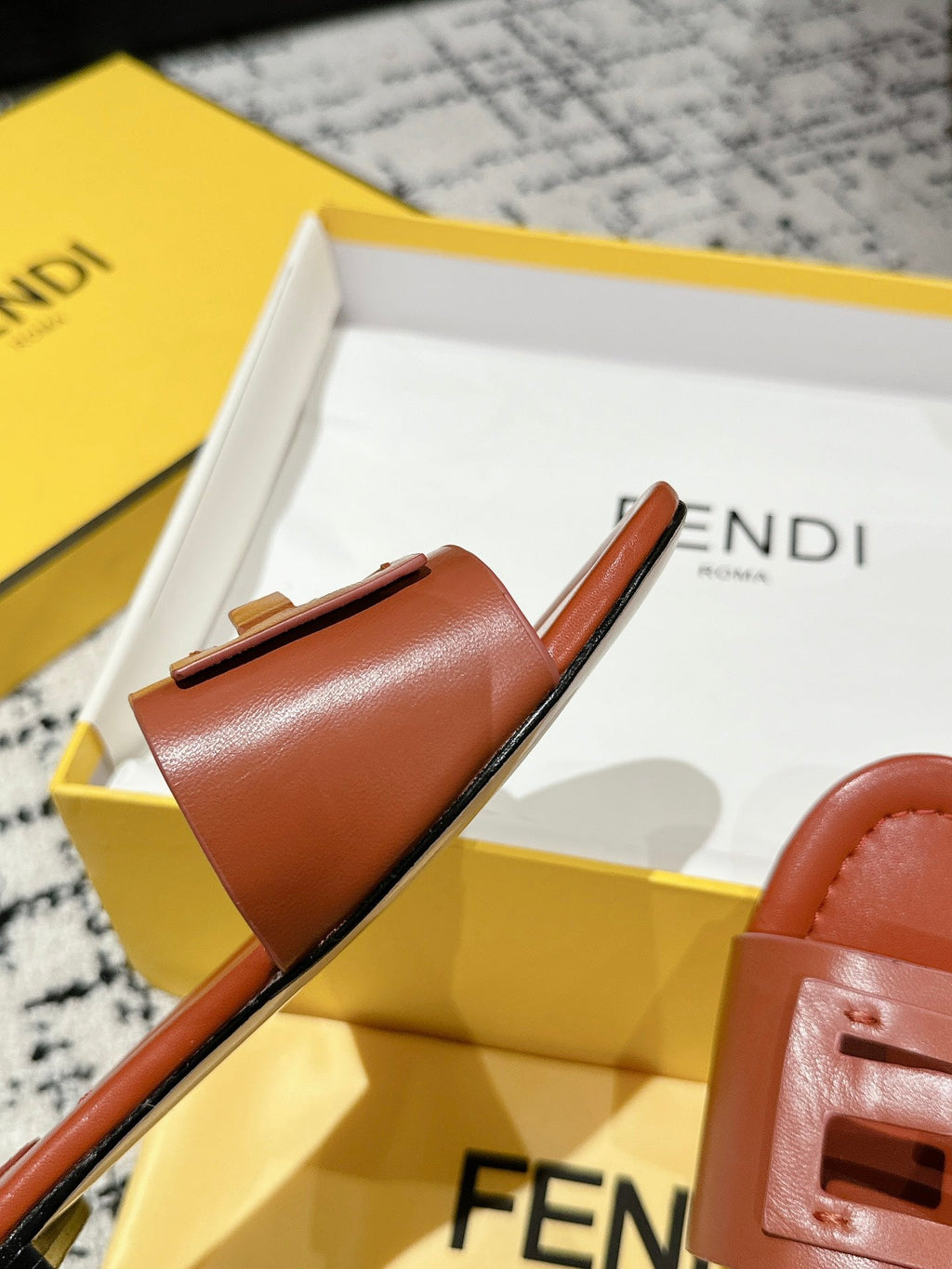 FF Baguette Rust Leather Slide