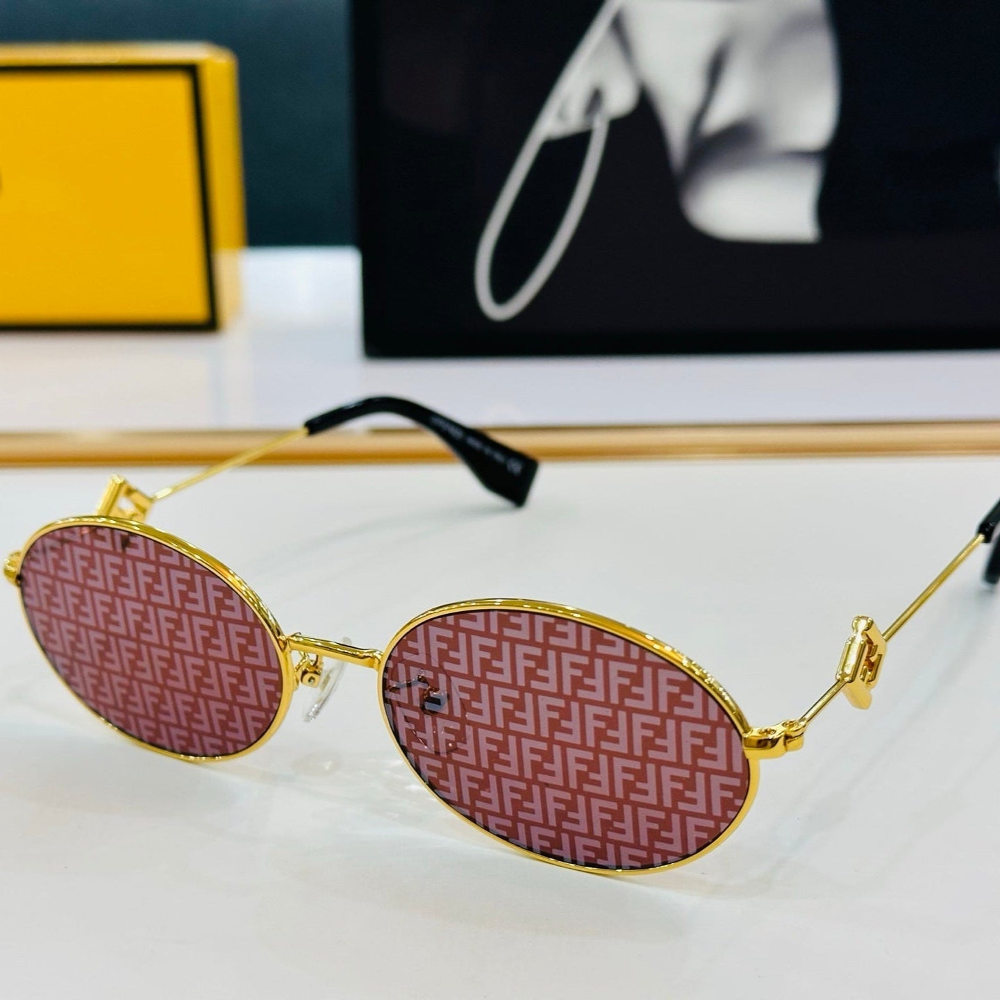 FIRST CRYSTAL OVAL FRAME SUNGLASSES E40151 IN METAL