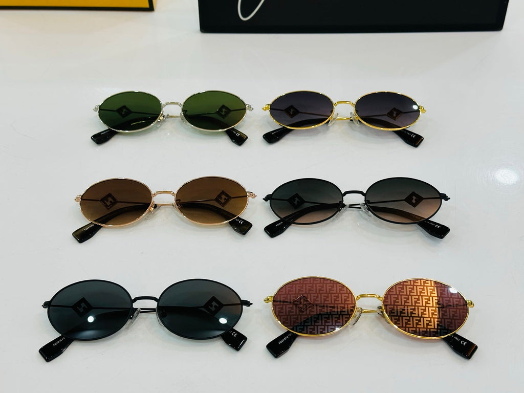 FIRST CRYSTAL OVAL FRAME SUNGLASSES E40151 IN METAL