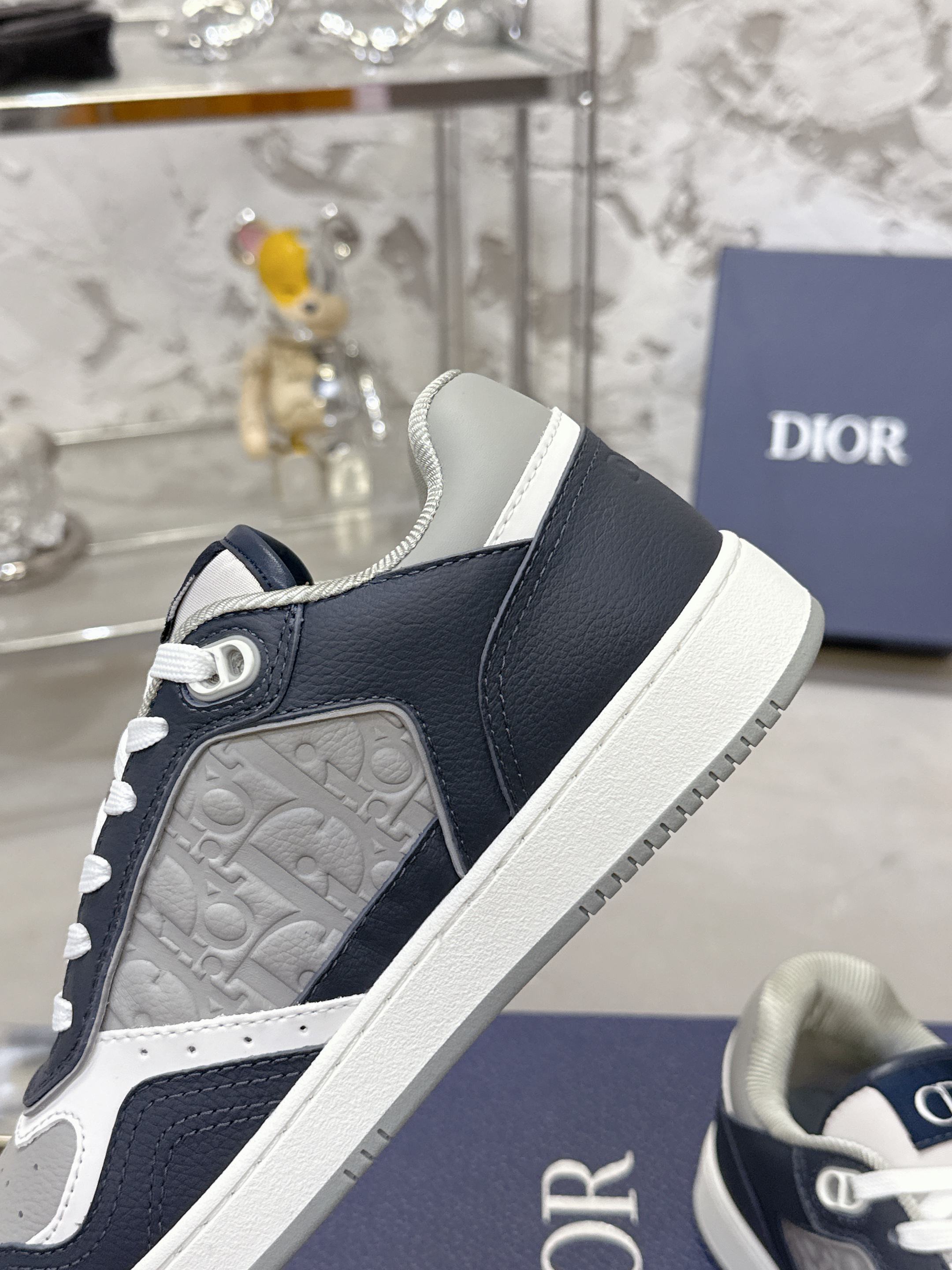 DIOR 25S B27 UPTOWN LOW-TOP SNEAKERS IN DARK BLUE MIX GREY CALFSKIN STYLE 2