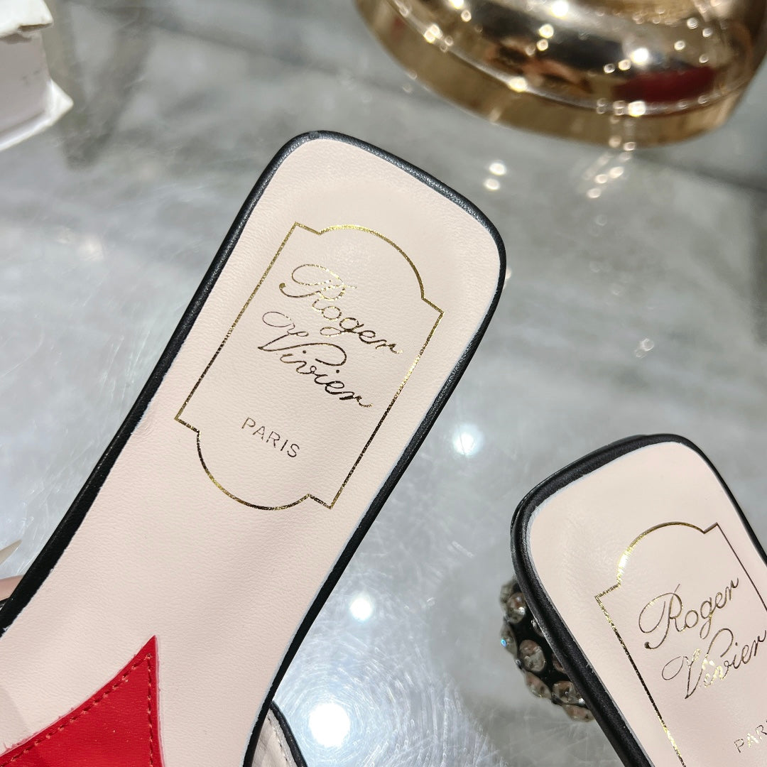 CRYSTAL HEEL MULE IN BLACK CALFSKIN