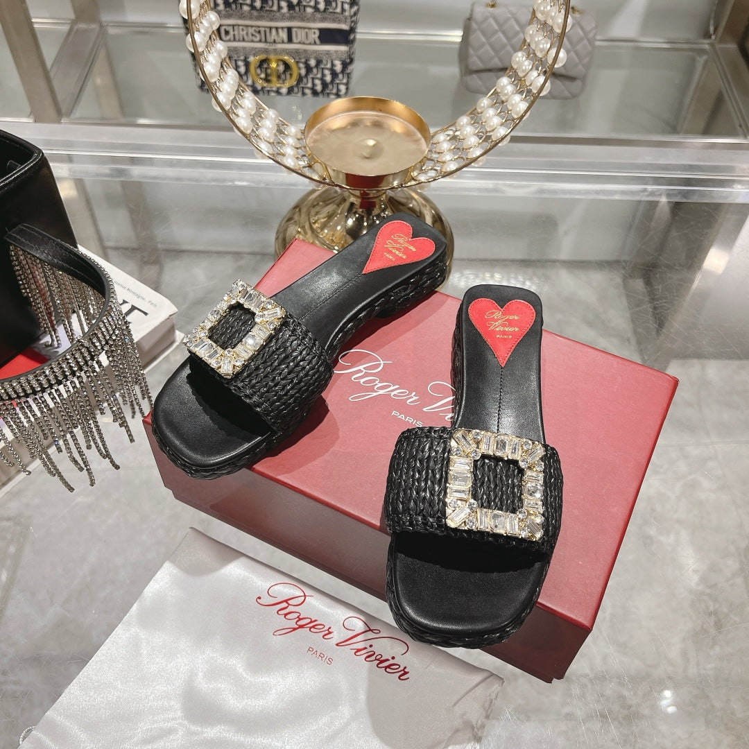 ESPADRILLES MULES IN BLACK RAFFIA