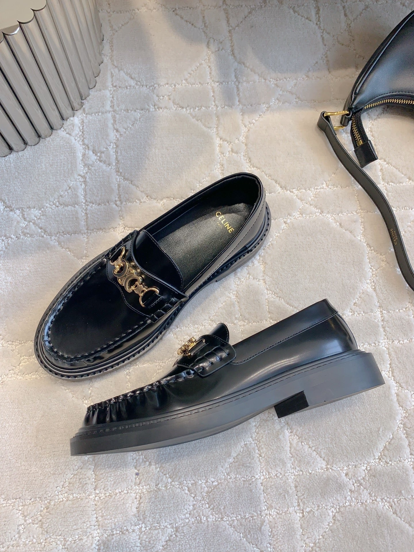 CHANEL 25S ARC DE TRIOMPHE LOAFERS IN BLACK SHINY CALFSKIN GOLD HARDWARE