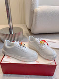 VIV' SKATE SNEAKERS IN WHITE CALFSKIN WITH CARTOON CHARM LACES