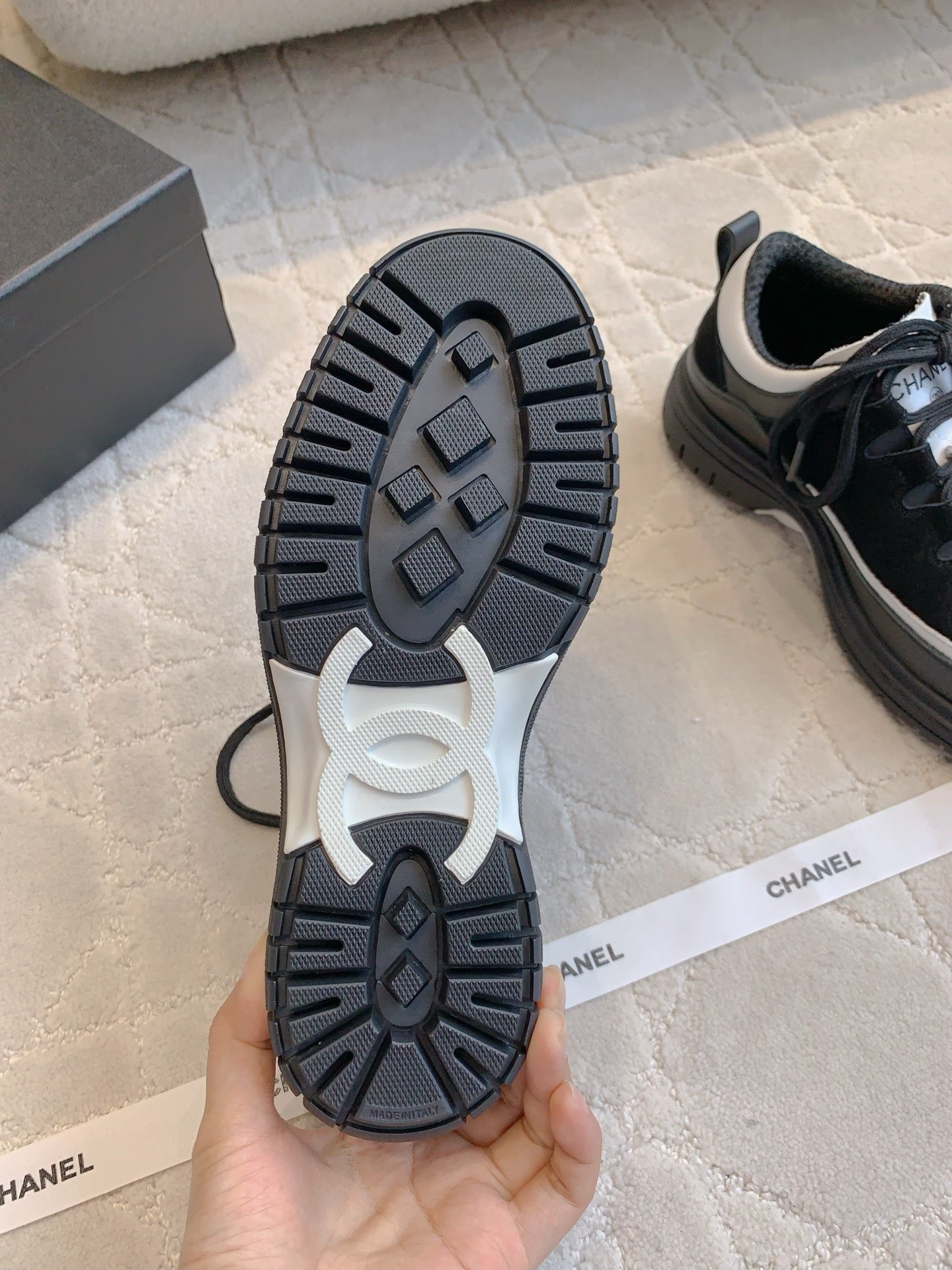 CHANEL 25S TRAINERS 40MM IN BLACK AND WHITE CALFSKIN AND SUEDE