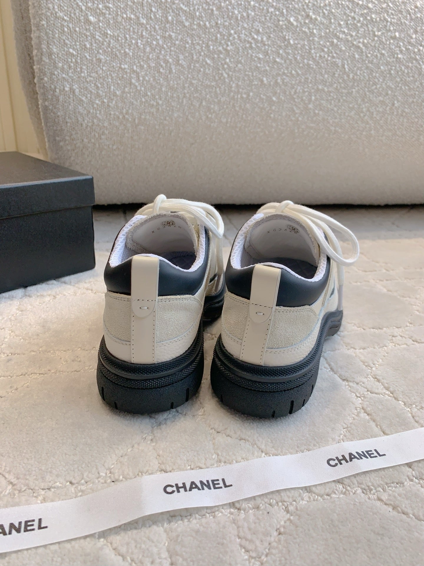 CHANEL 25S TRAINERS 40MM IN WHITE AND BLACK CALFSKIN