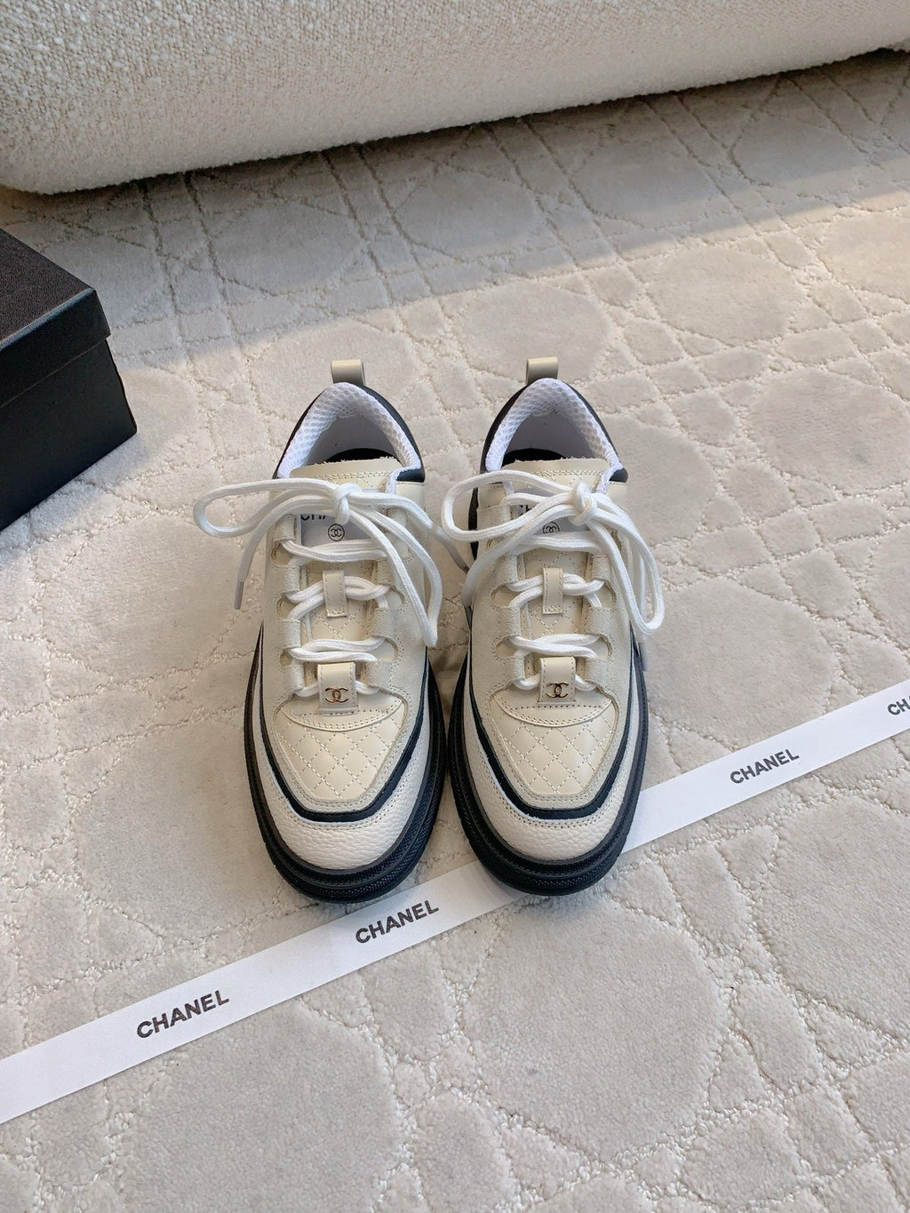 CHANEL 25S TRAINERS 40MM IN WHITE AND BLACK CALFSKIN