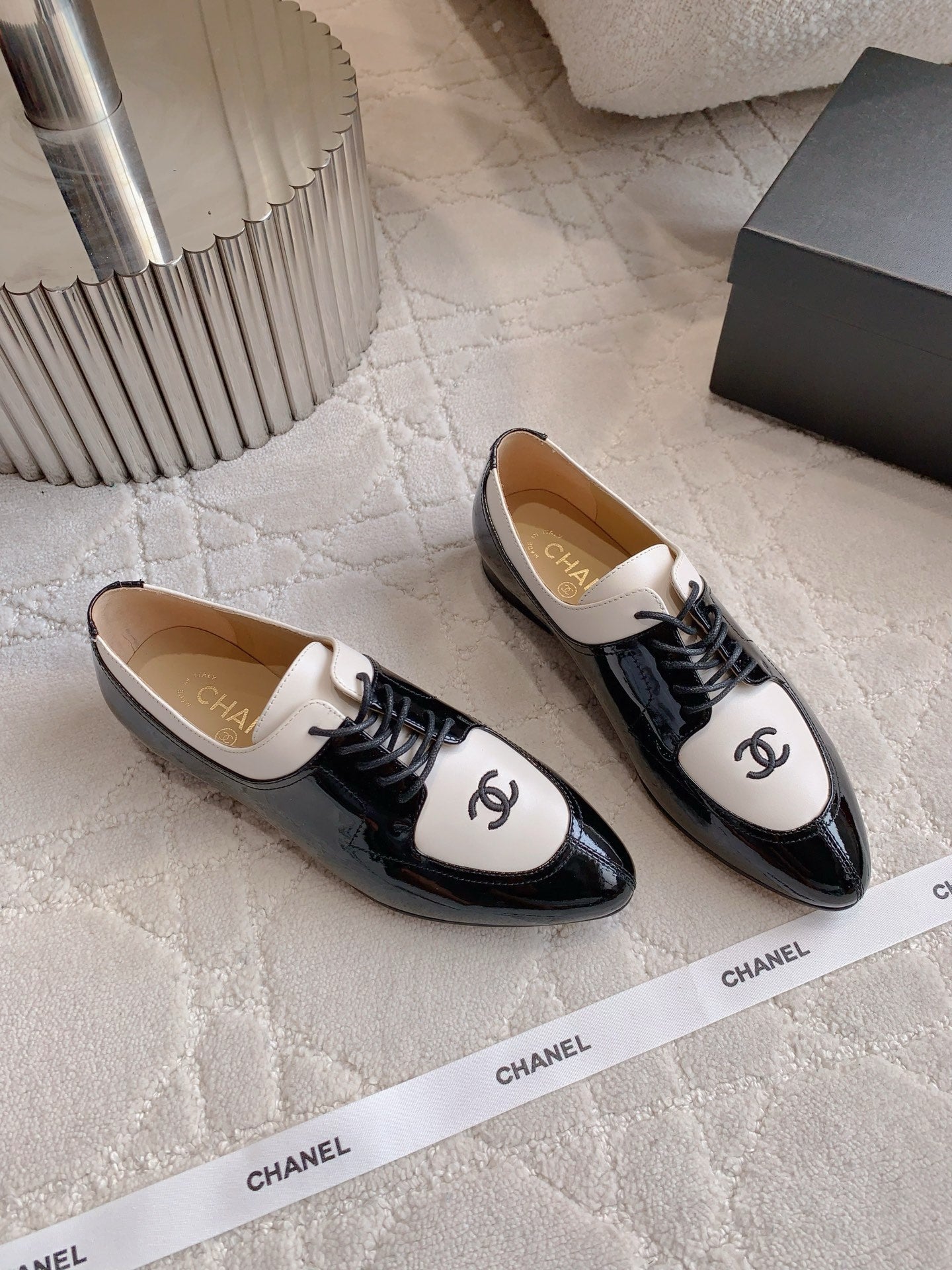 CHANEL 25S TWO TONE LACE UP IN BLACK AND WHITE SHINY CALFSKIN