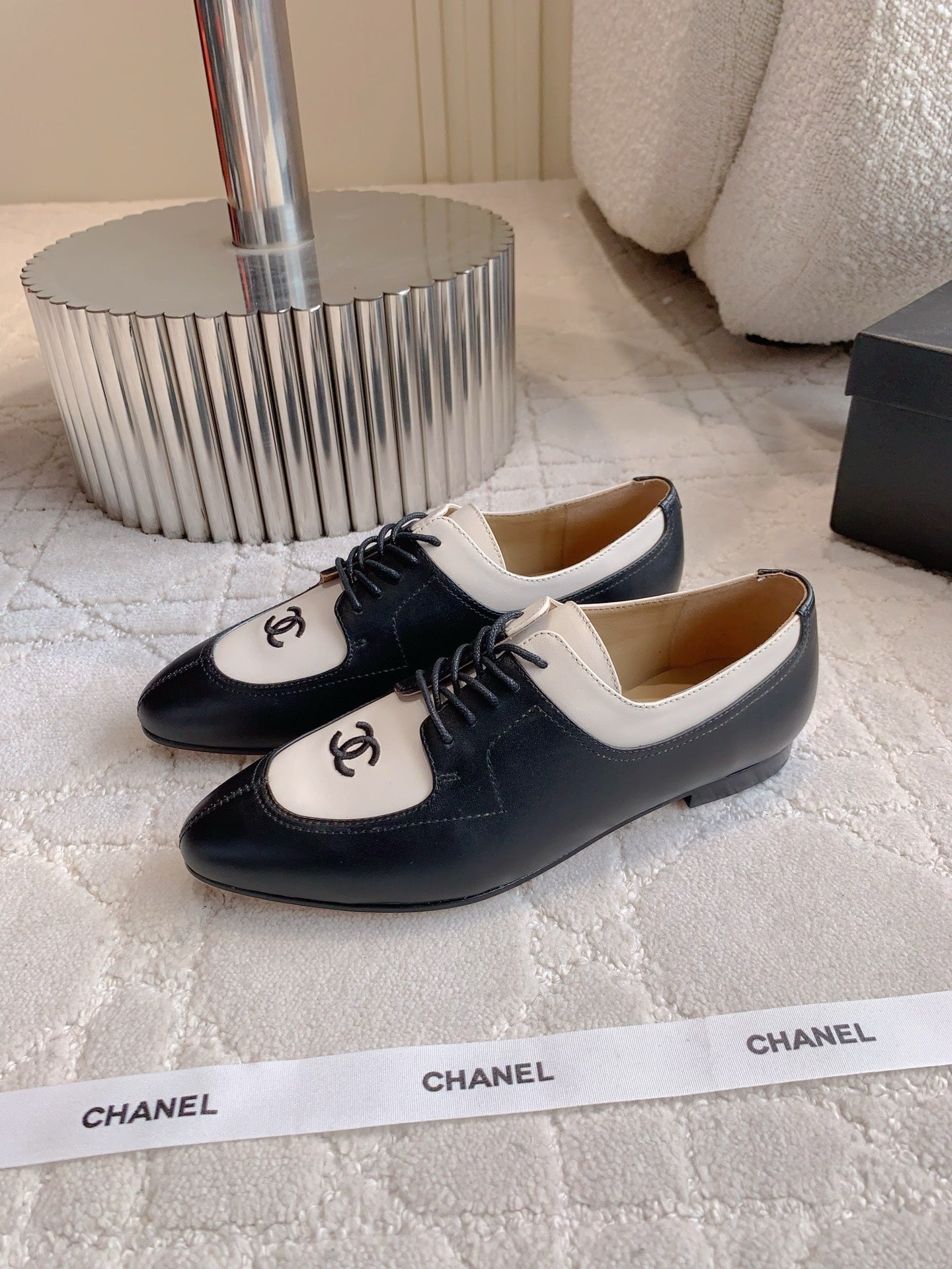 CHANEL 25S TWO TONE LACE UP IN BLACK AND WHITE CALFSKIN