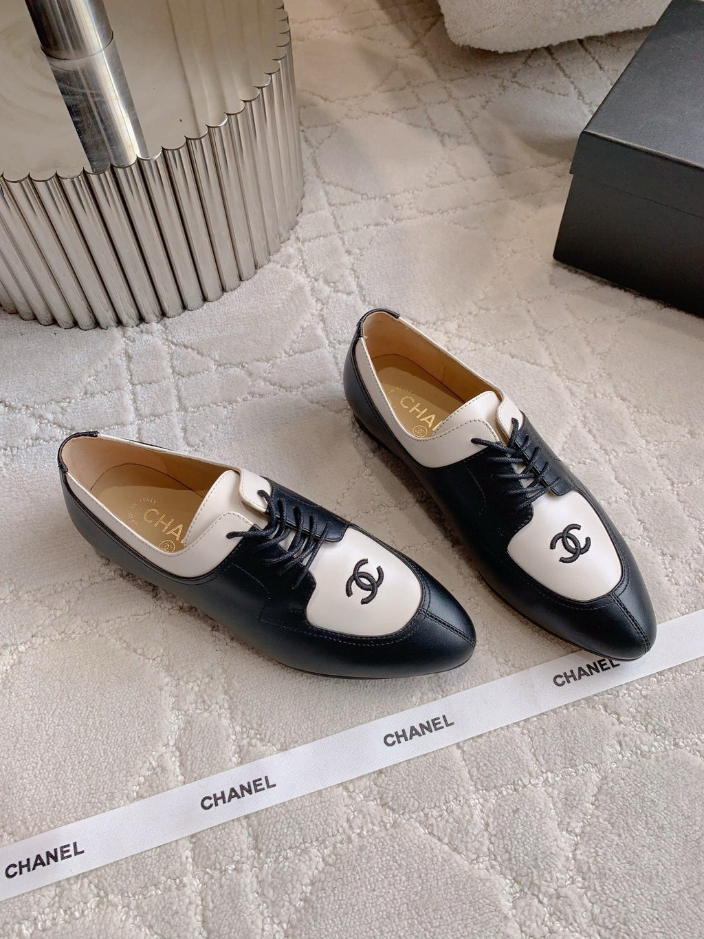 CHANEL 25S TWO TONE LACE UP IN BLACK AND WHITE CALFSKIN