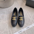 CHANEL 25S LOAFERS WITH LARGE LOGO IN BLACK CALFSKIN GOLD HARDWARE