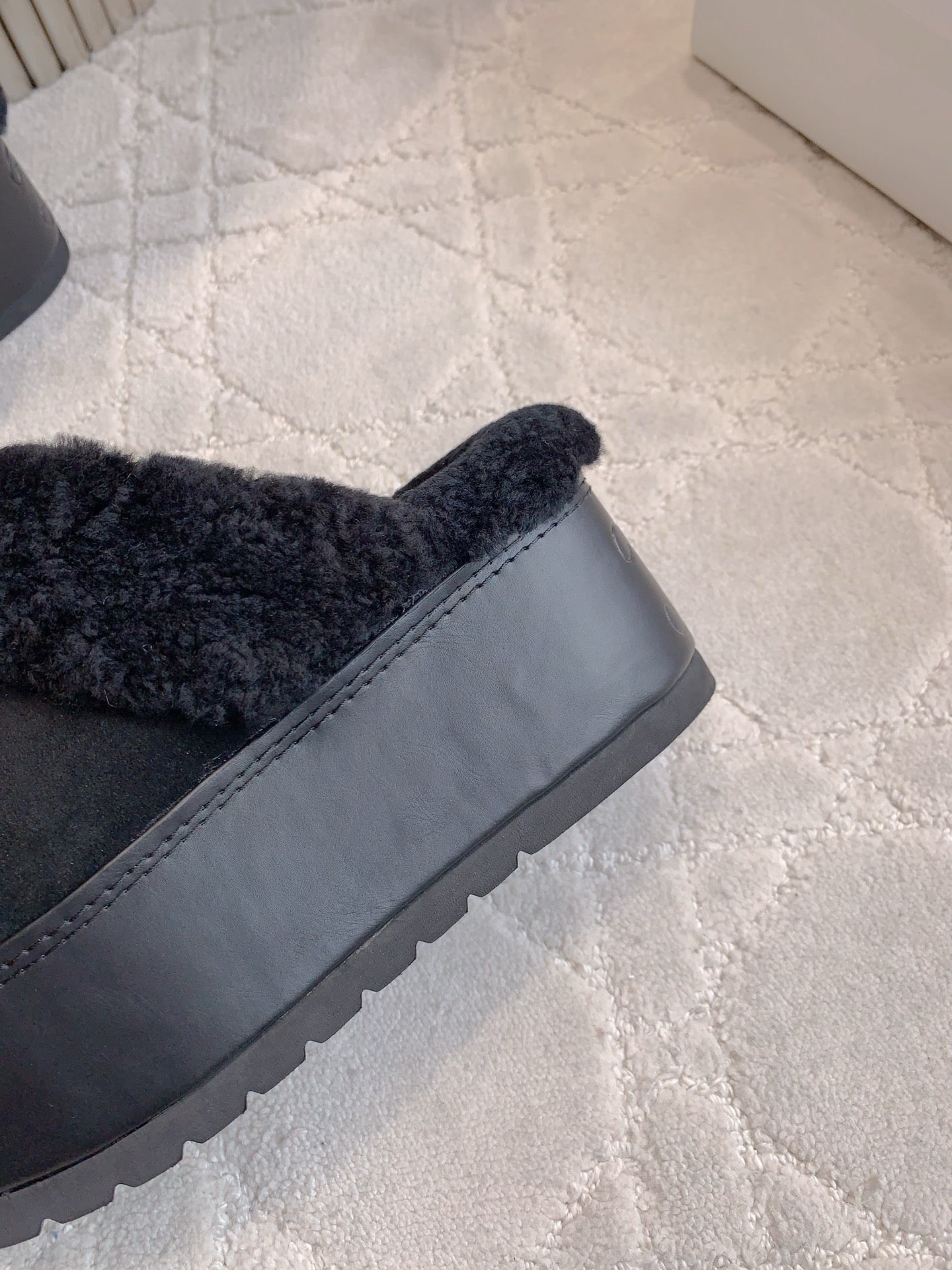 CELINE 25S DANA WEDGE MULE 70MM IN BLACK SUEDE CALFSKIN AND SHEARLING