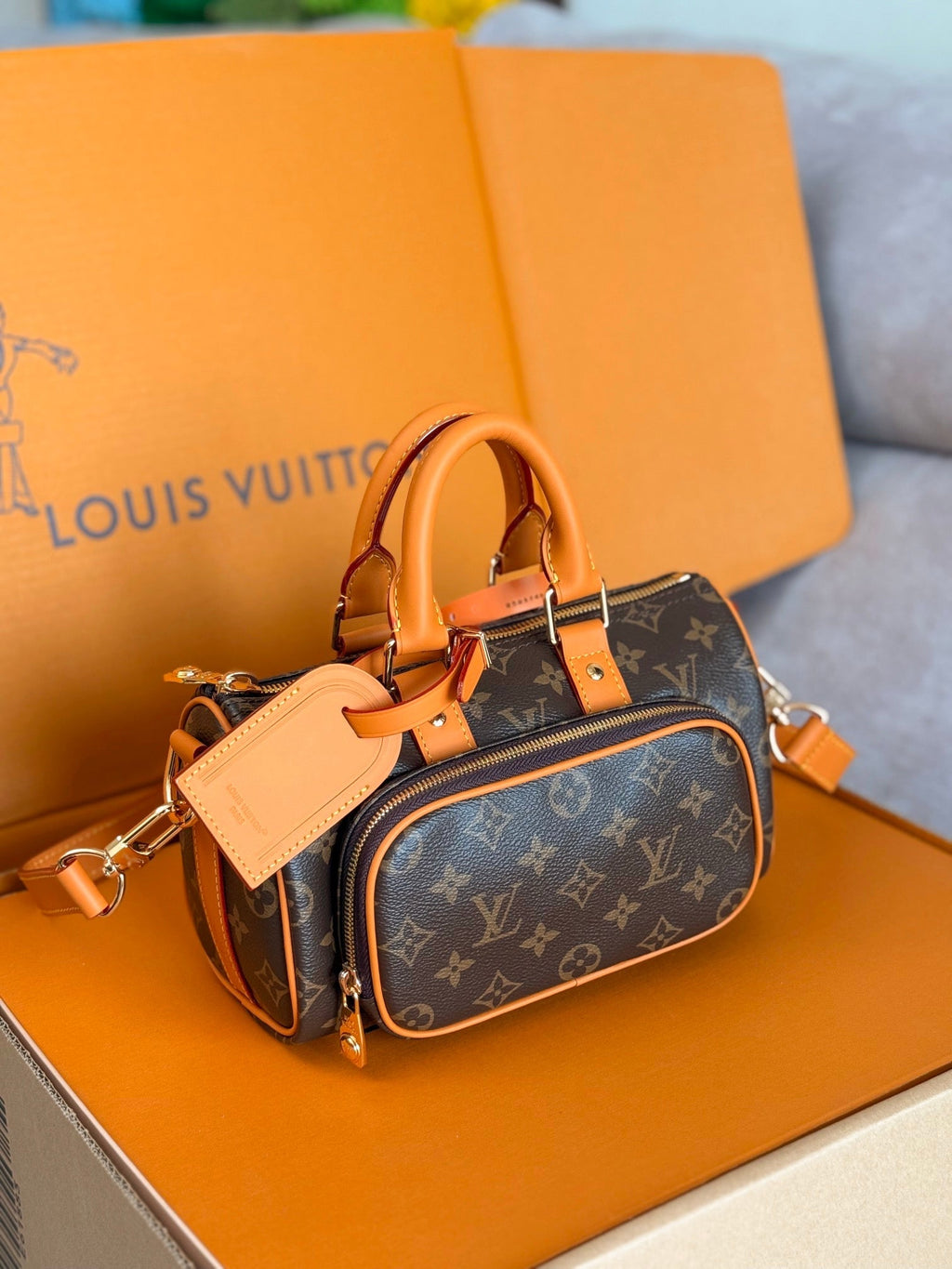 LV 25S KEEPALL CARGO 25 IN BROWN MONOGRAM CANVAS AND CALFSKIN GOLD HARDWARE